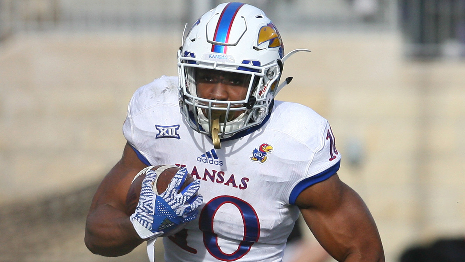 Jayhawks' road woes continue with 42-30 loss to Ohio