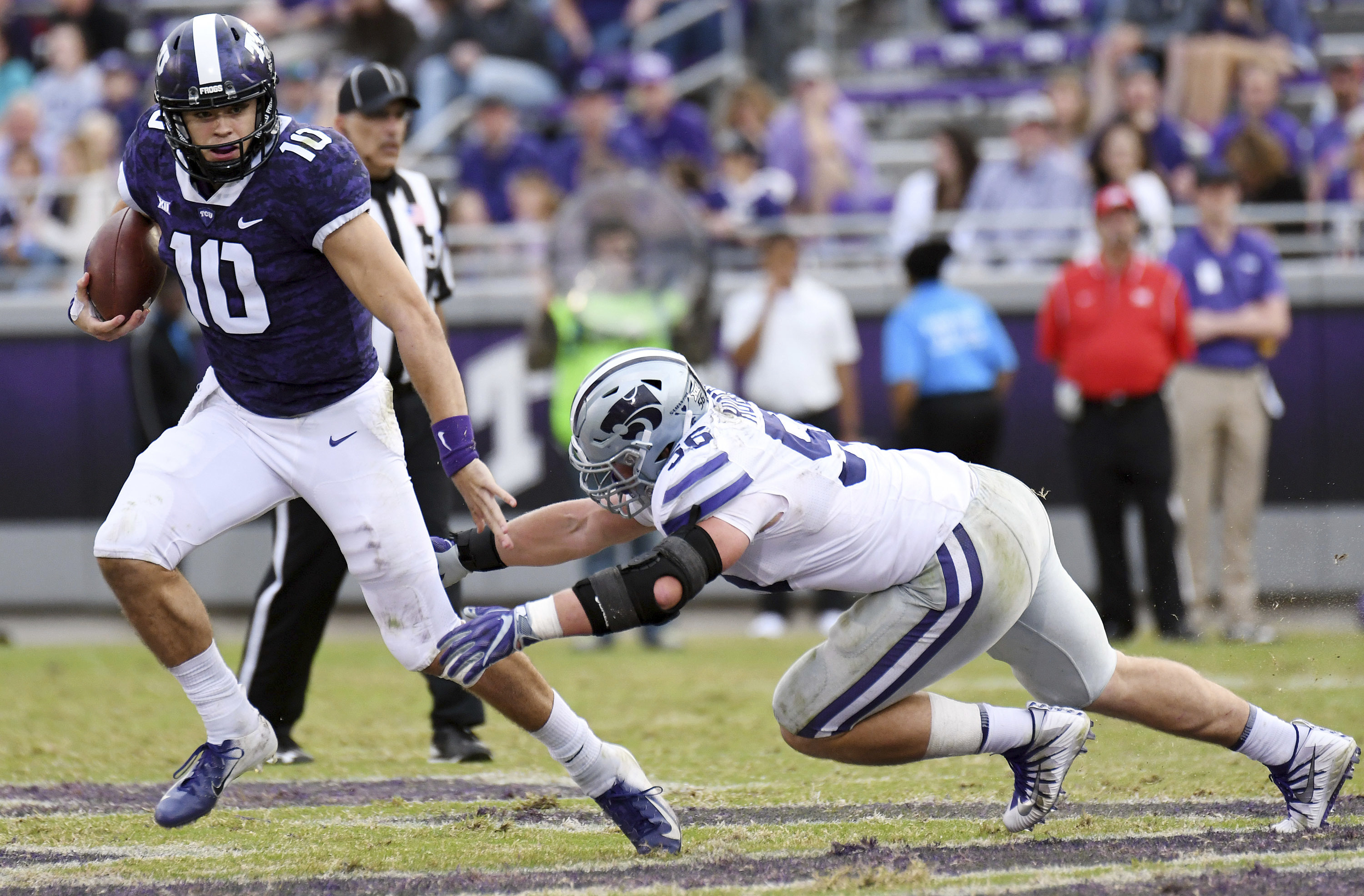 TCU hangs on for 14-13 win after K-State misses tying PAT