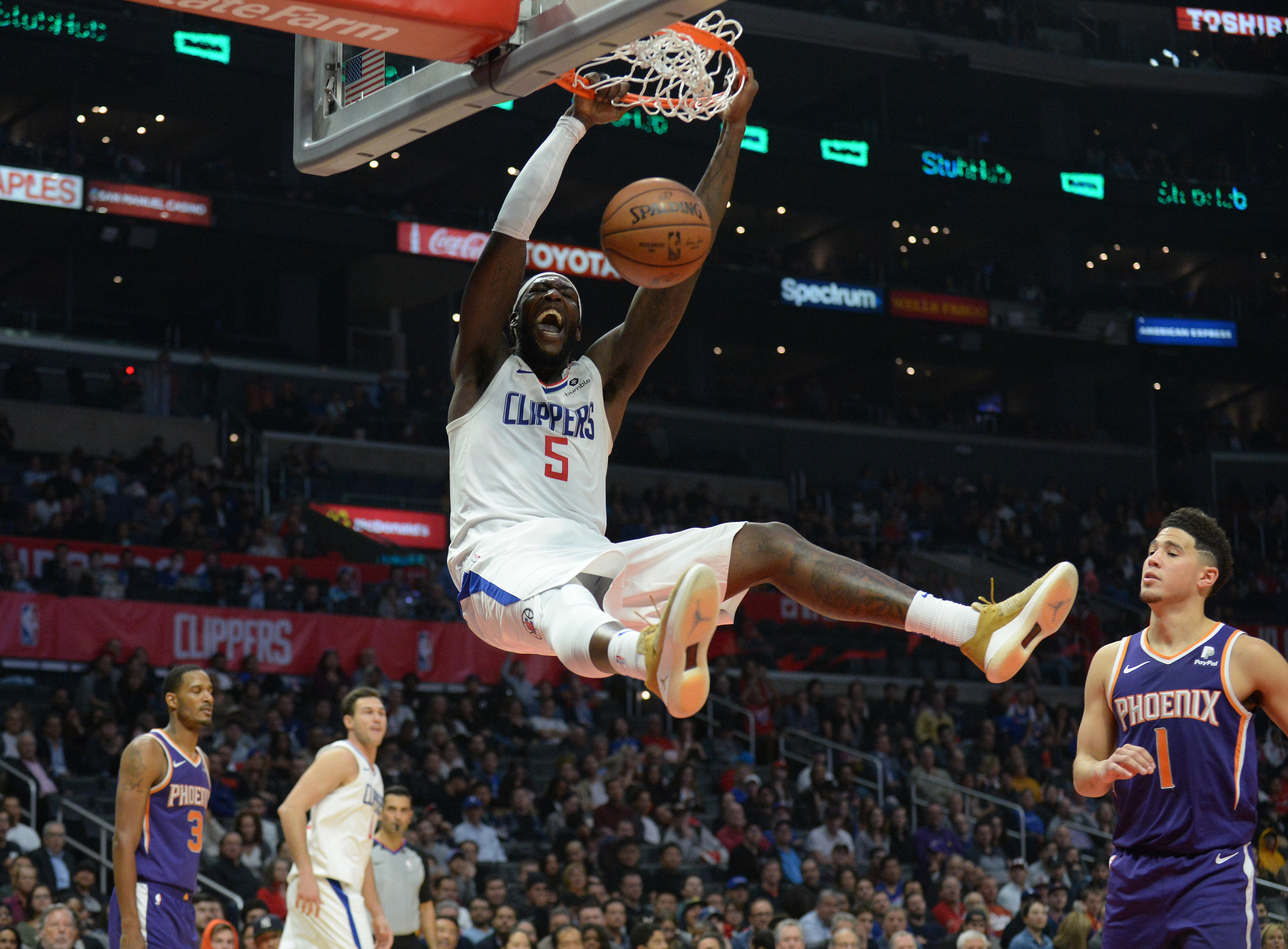 Harris, Harrell help Clippers hold off Kings 133-121