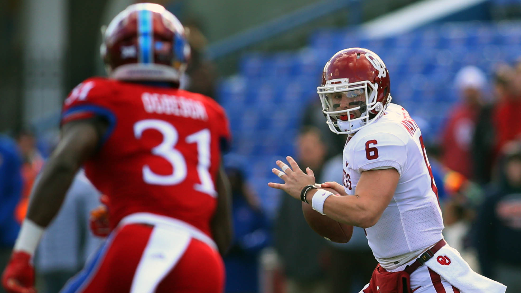 Oklahoma's Mayfield shakes off Kansas, hands Jayhawks 10th loss