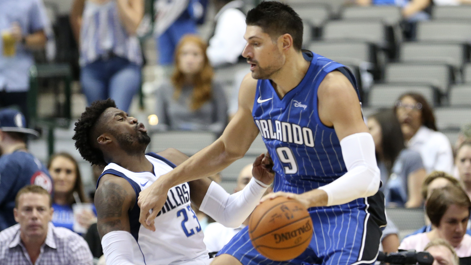 Nikola Vucevic grabs 14 boards but Magic drop preseason game to Mavericks