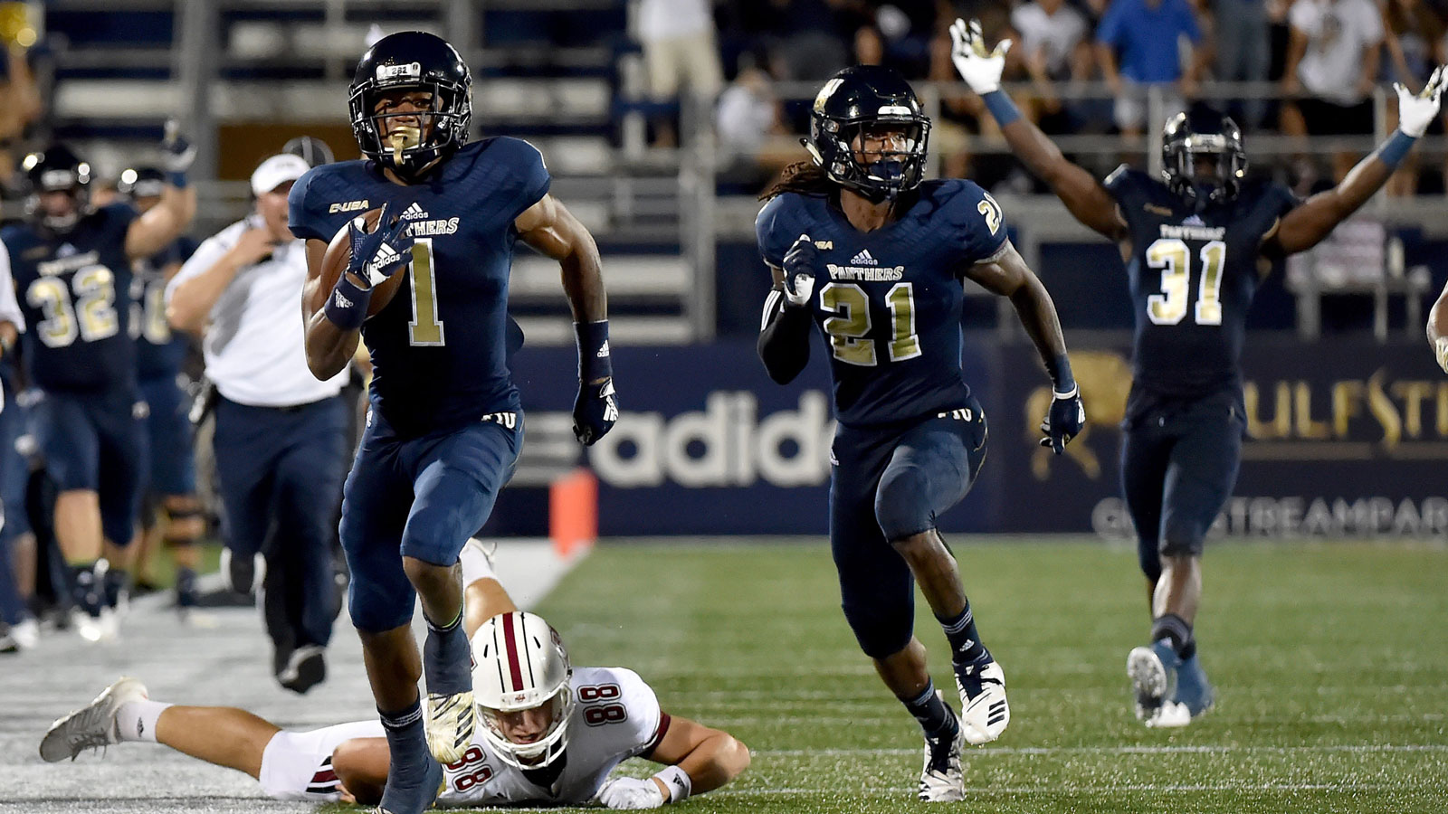 FIU's rushing attack tramples UMass in 63-24 win