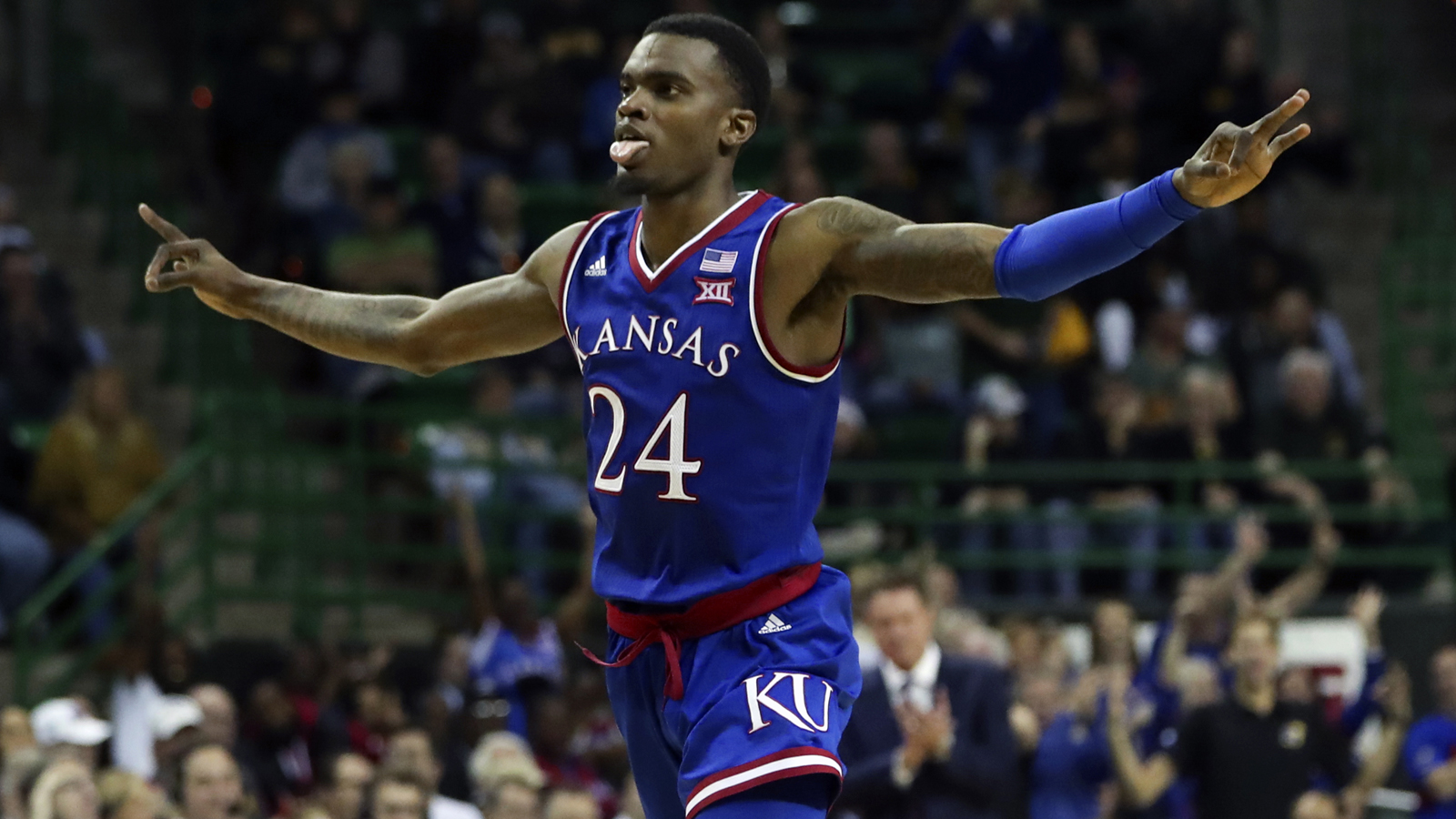 Vick sinks six 3-pointers in Kansas' 73-68 win over Baylor