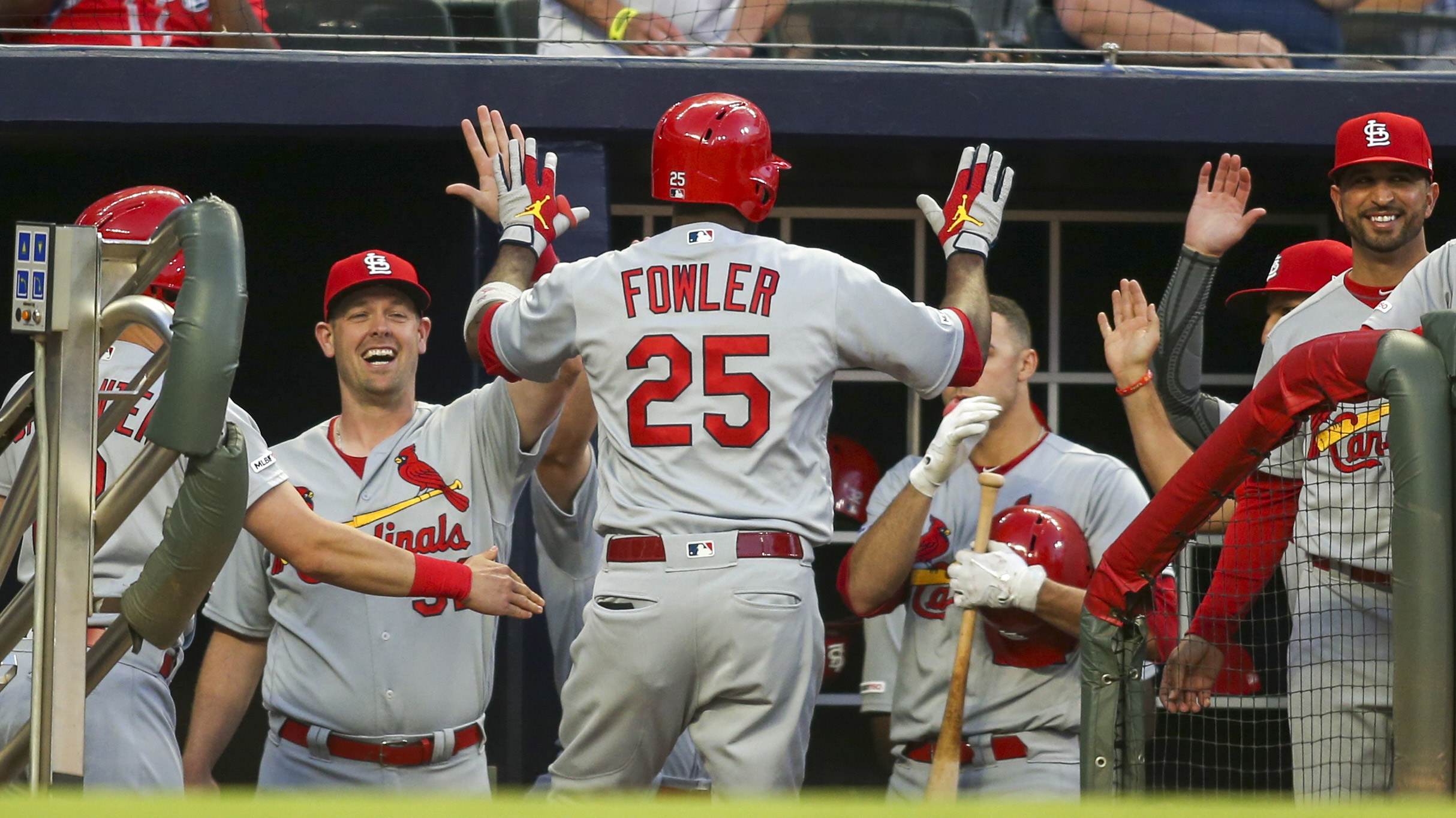 Cardinals launch four homers, dominate Braves in 14-3 win