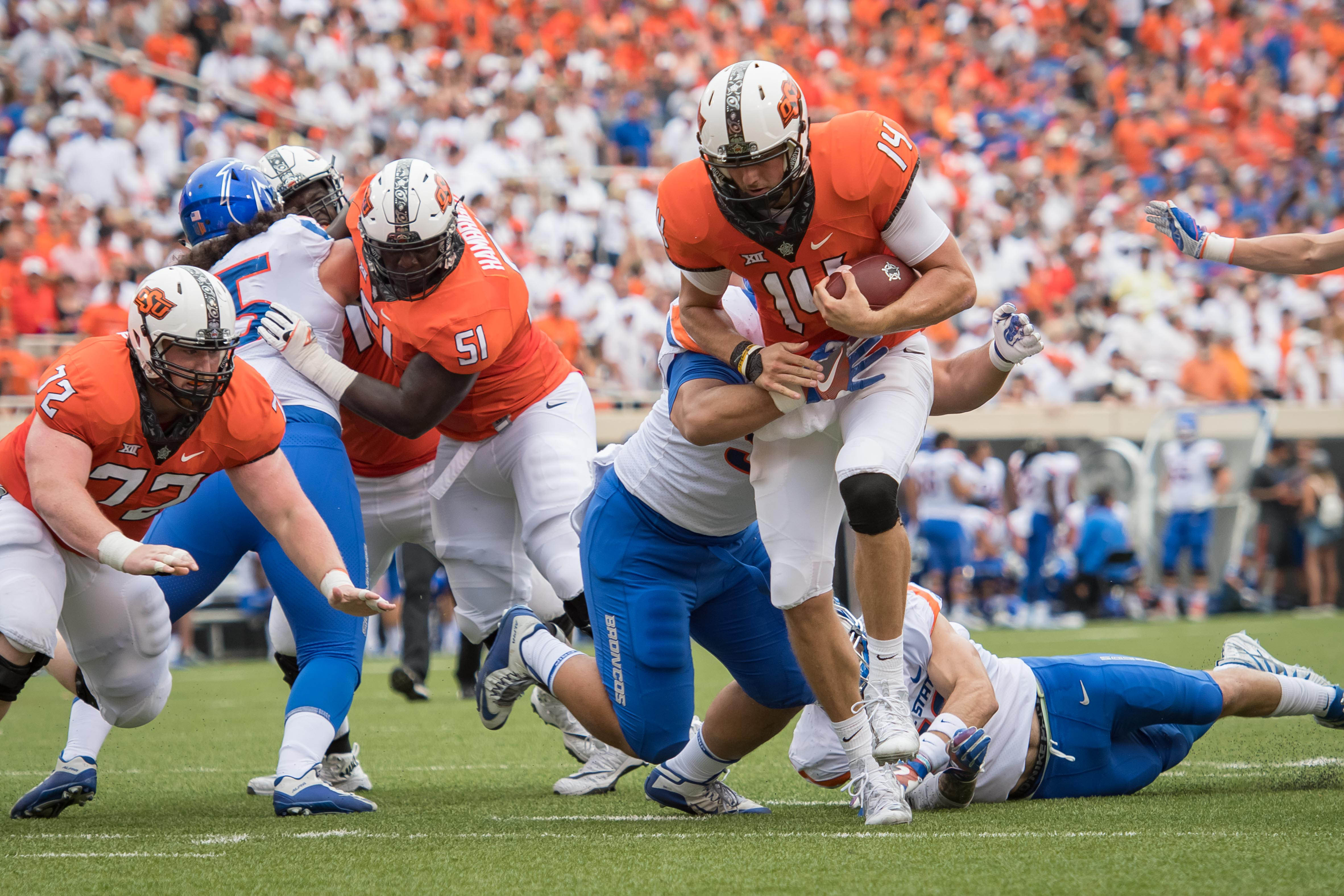 Cornelius leads No. 24 Oklahoma St. past No. 17 Boise St.