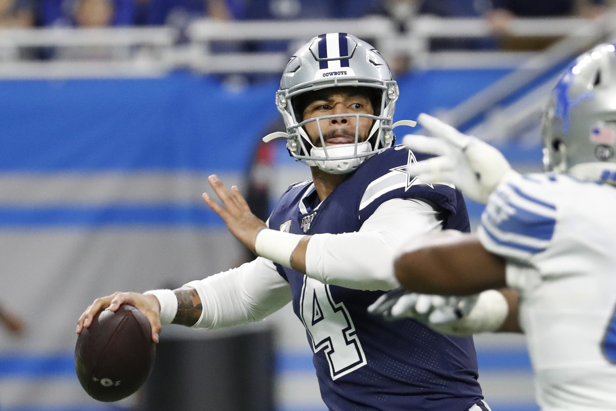 Cowboys get huge day from Prescott, beat Lions 35-27