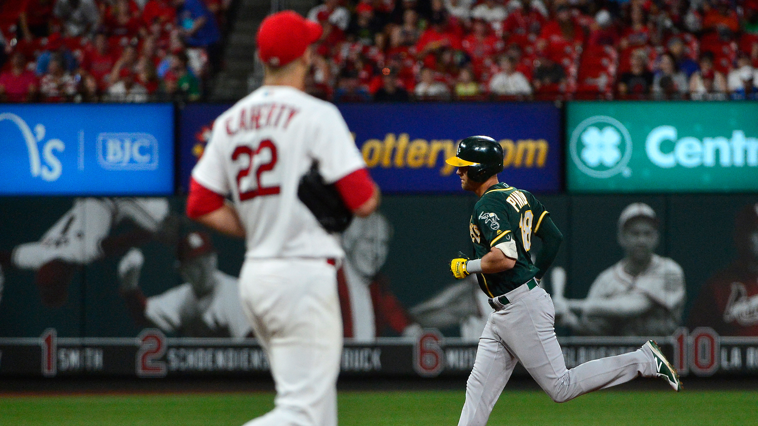 Cardinals can't cash in on multiple chances, lose to A's 7-3