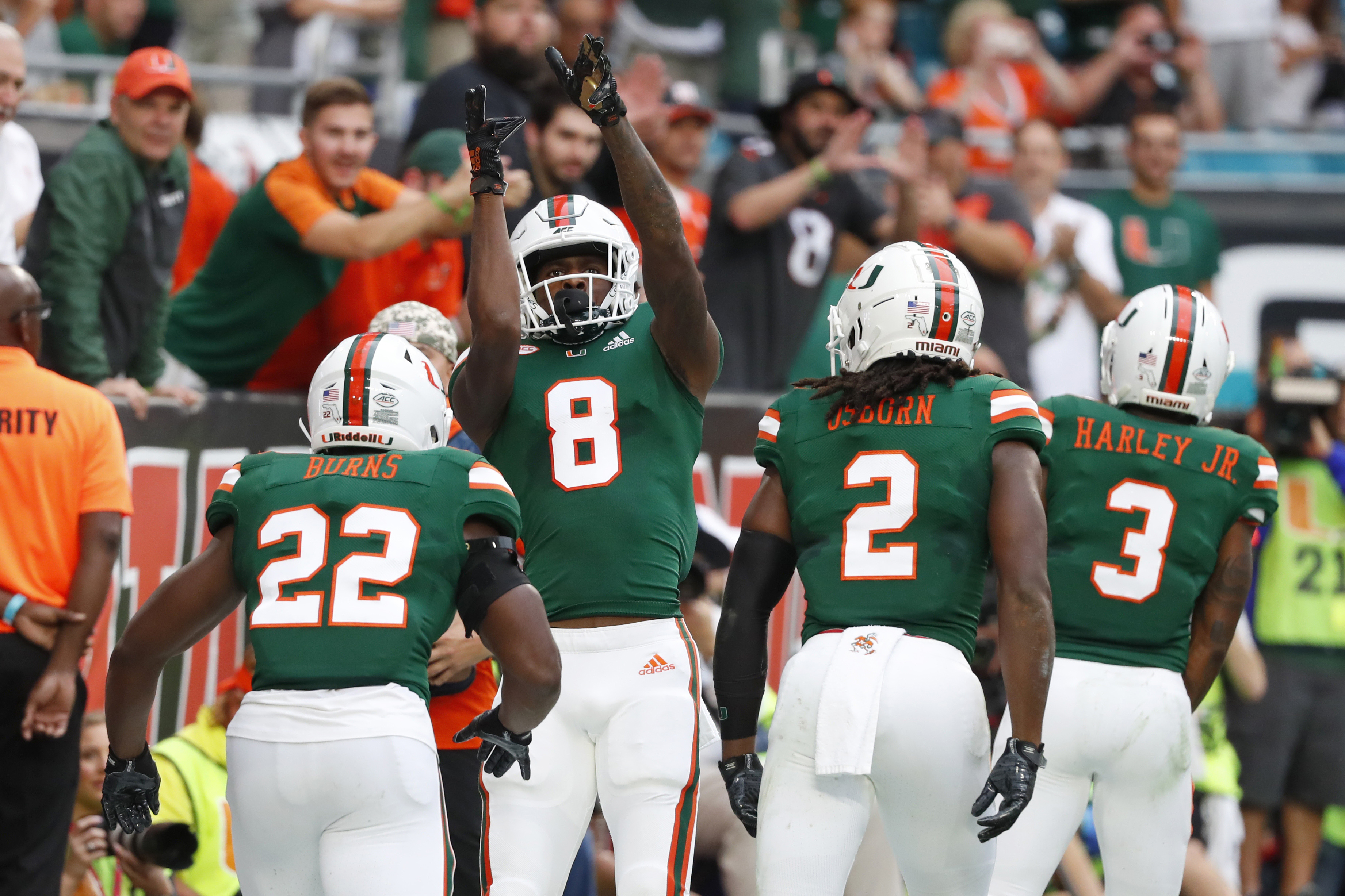 Williams (6 TDs) sets Miami mark, Canes top Louisville 52-27