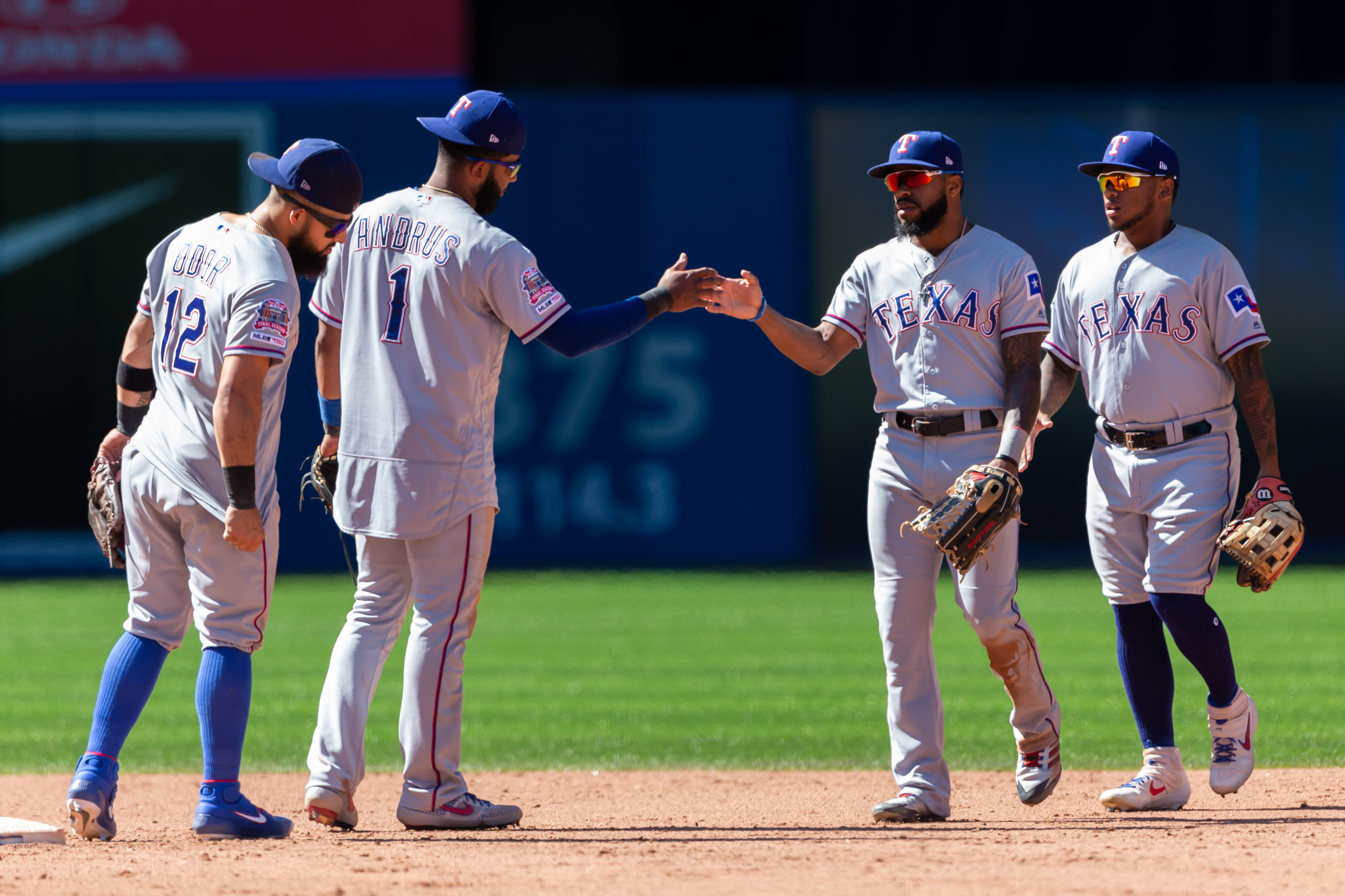 Andrus gets 4 hits, Rangers beat Jays 7-3 to avoid sweep