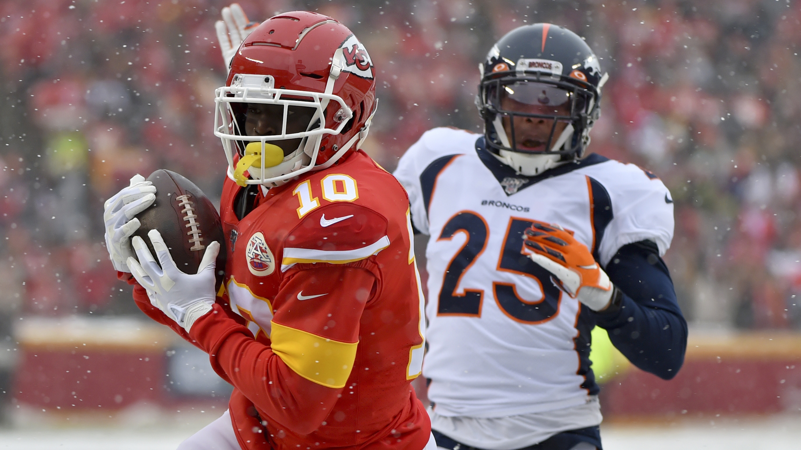 Chiefs hold Broncos without a touchdown in snowy 23-3 victory