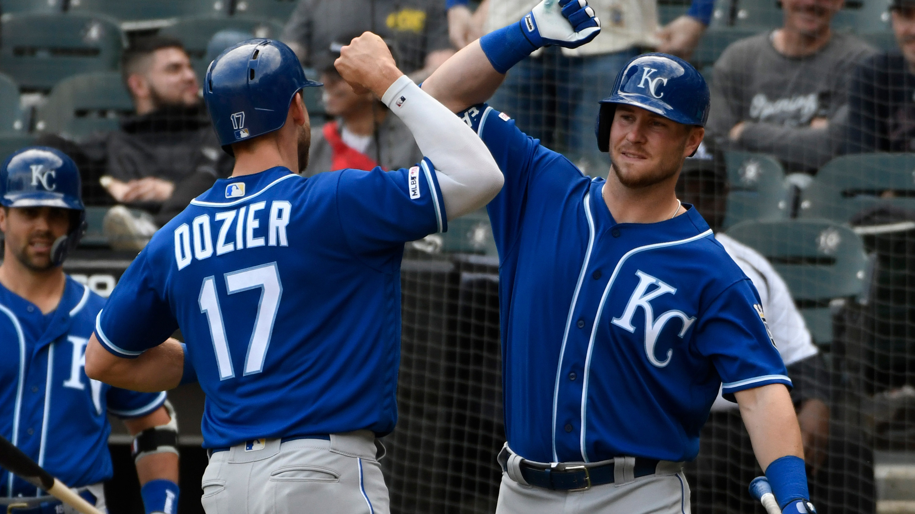 Dozier's homer in 10th lifts Royals over White Sox; ejections follow benches clearing