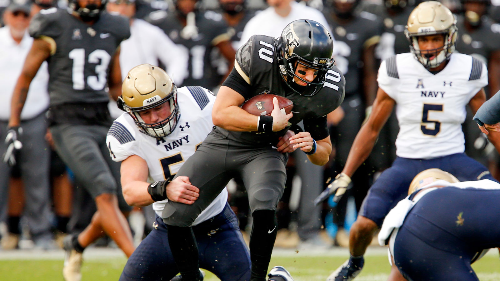 McKenzie Milton helps No. 11 UCF extend nation's longest winning streak to 22 games with win over Navy