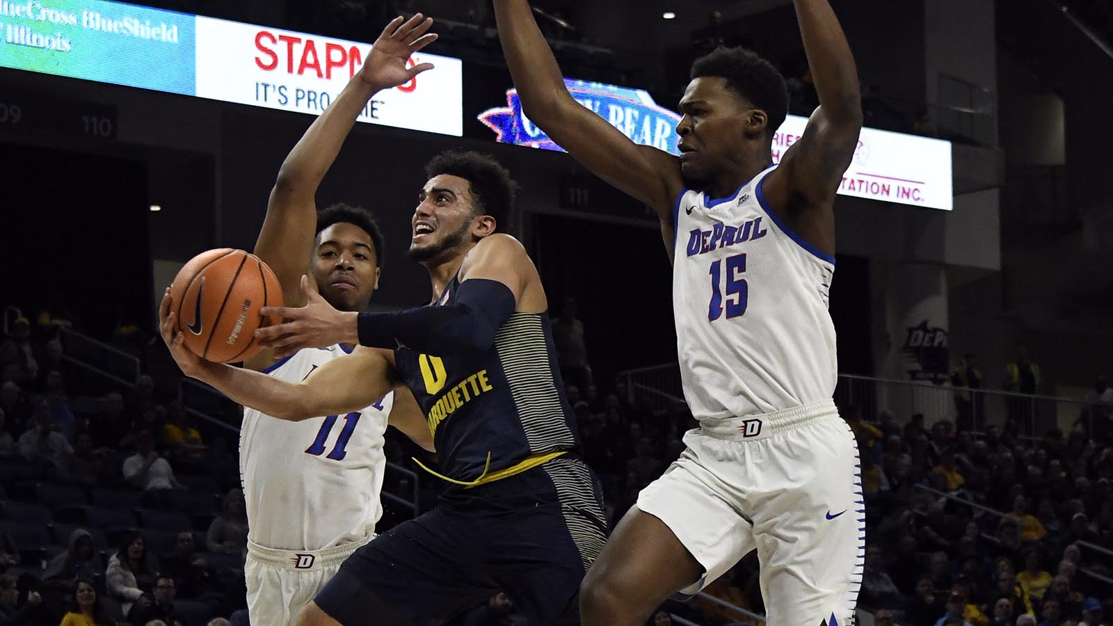 Marquette falls to DePaul in Howard's return