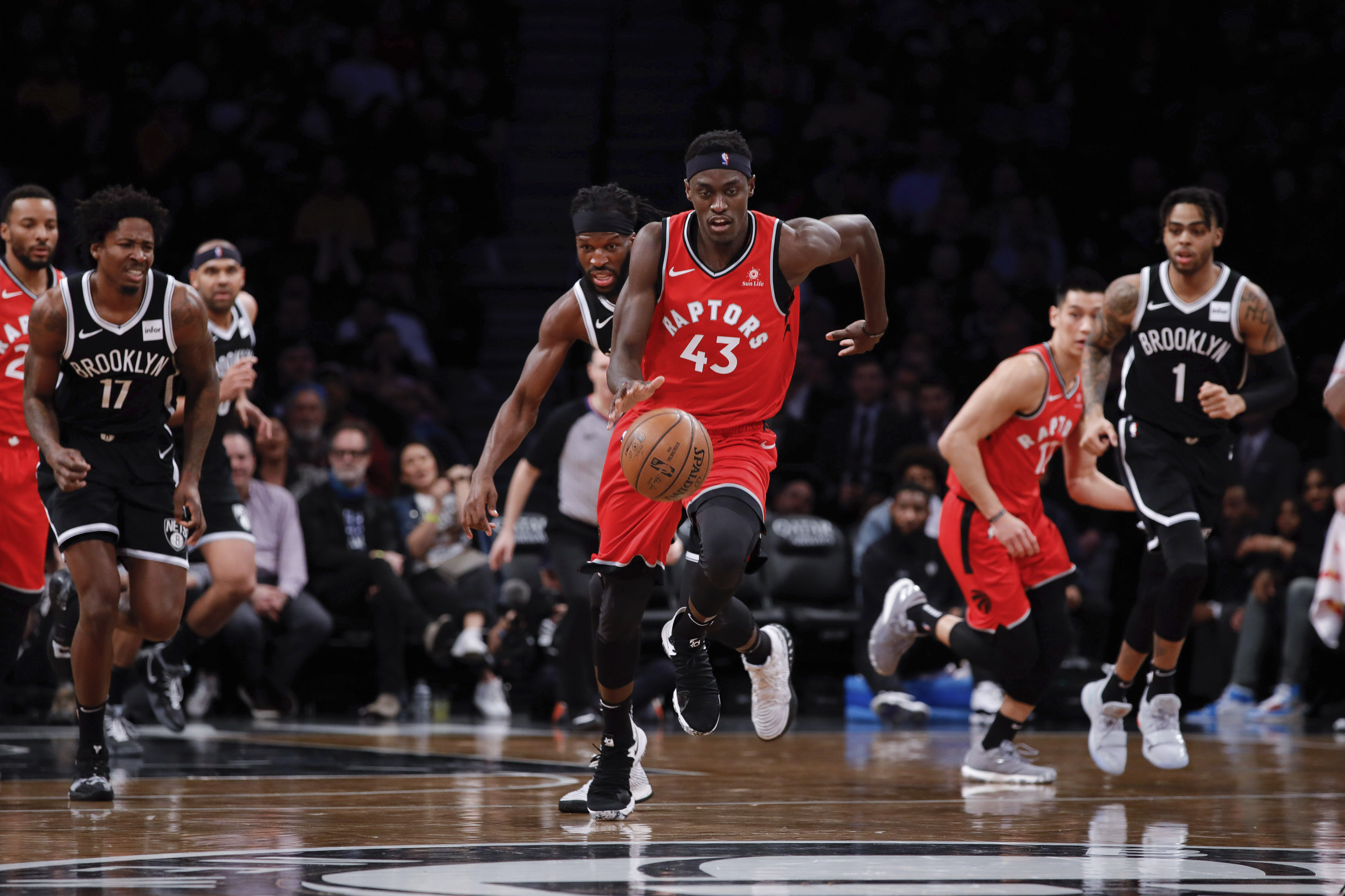 Siakam, Leonard lead Raptors past Nets 115-105