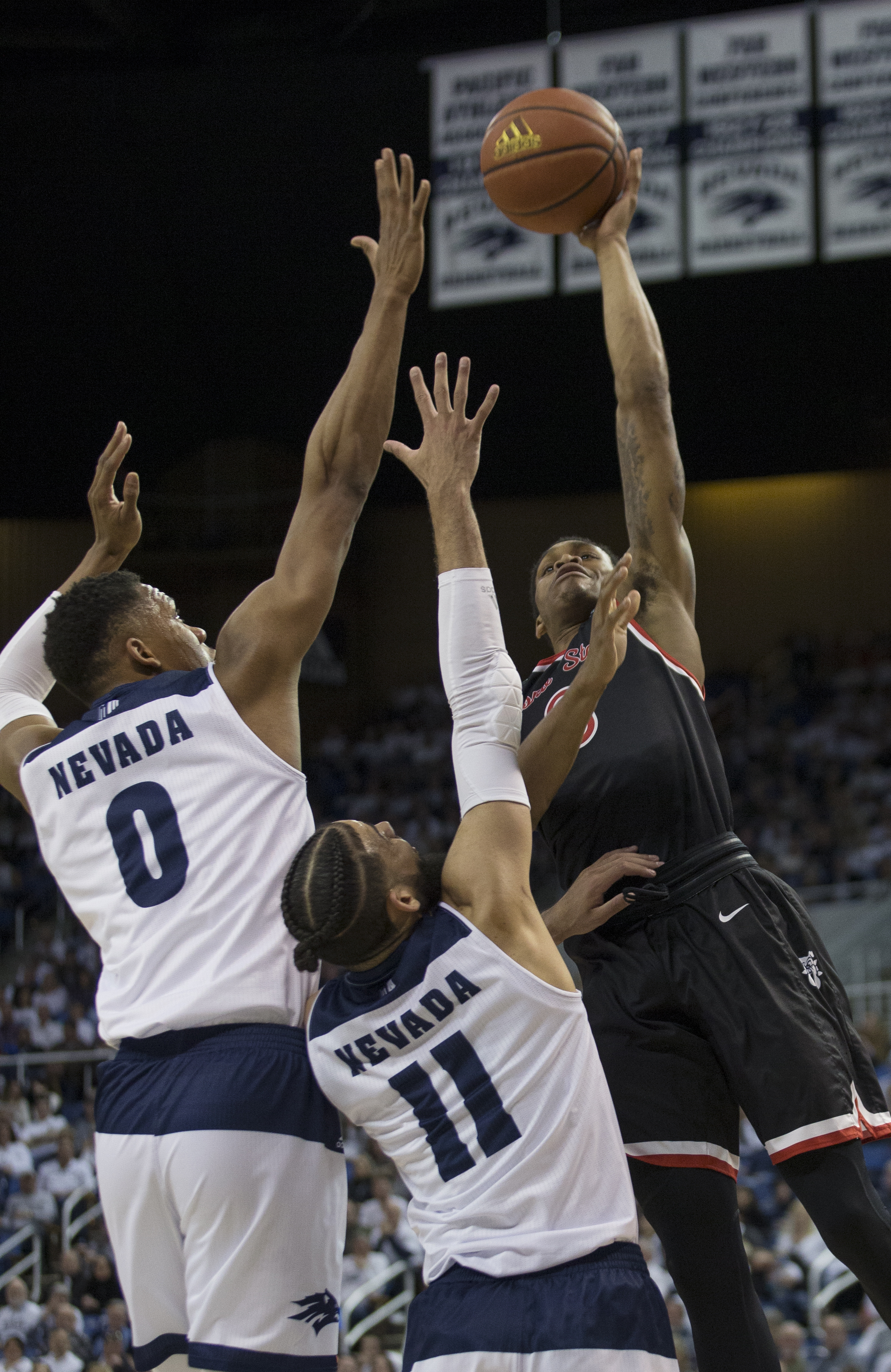 Martin leads No. 6 Nevada to 74-68 win over Fresno State