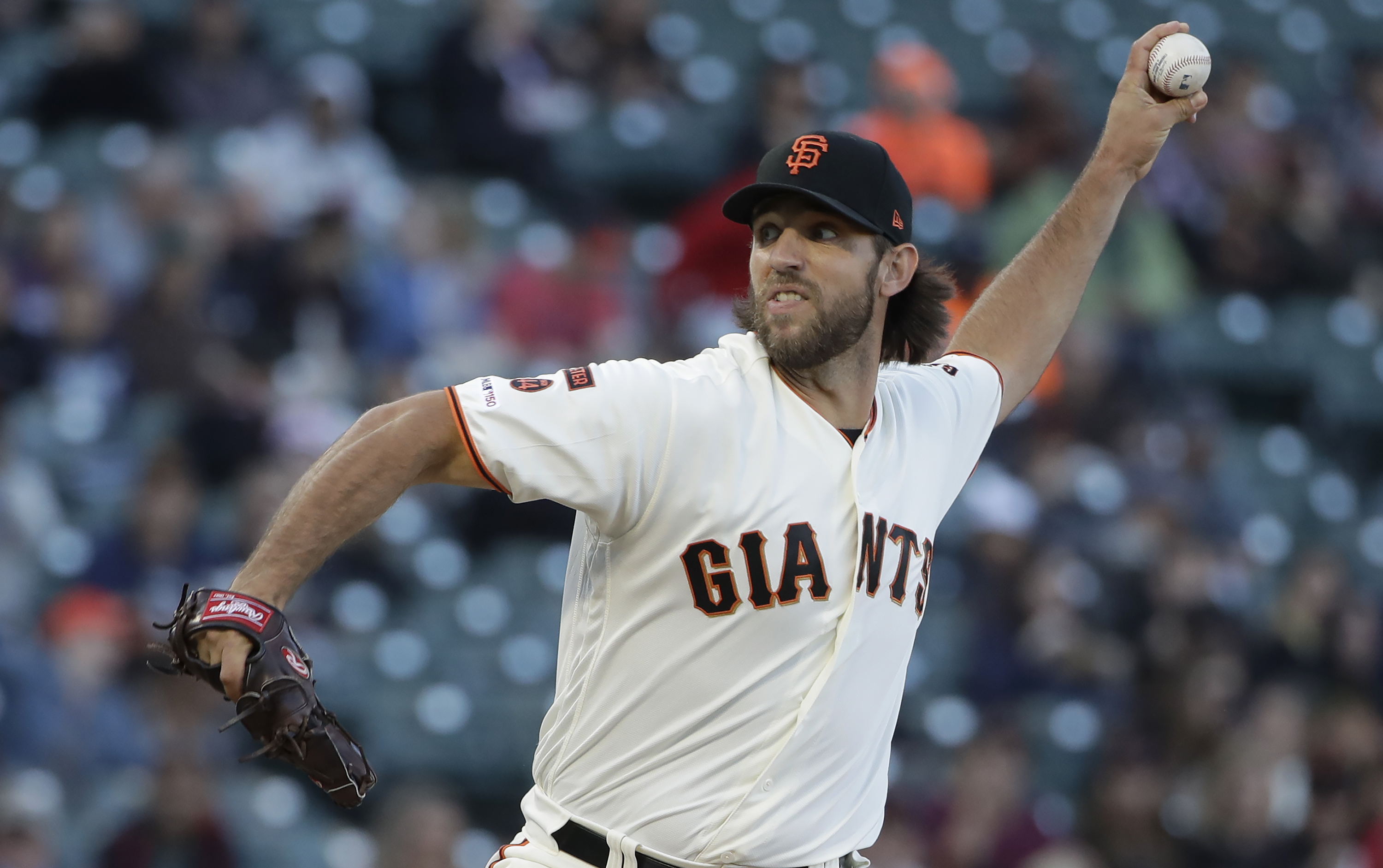 Bumgarner strikes out 11 in Giants' 4-2 win over Rockies