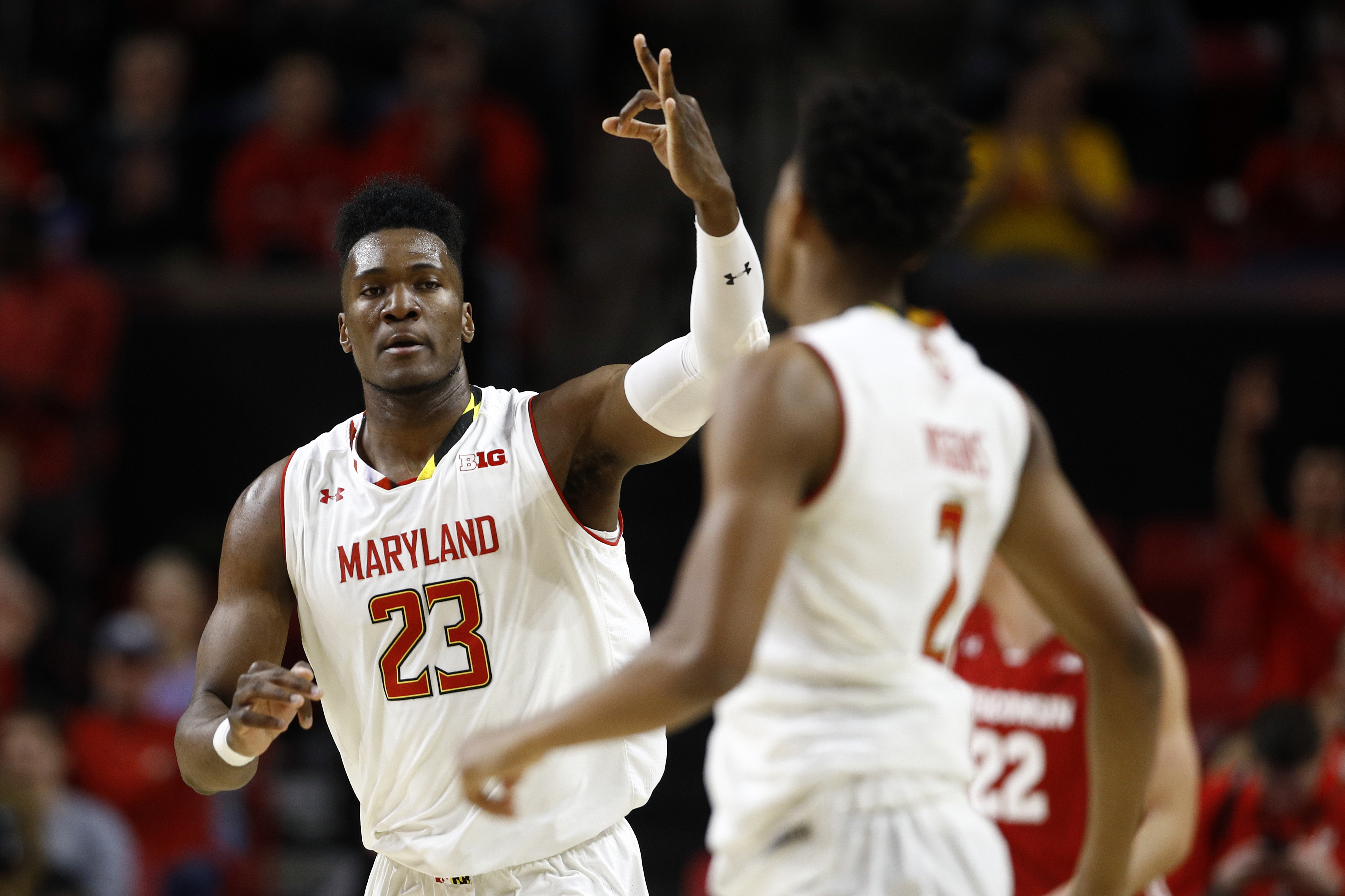 No. 19 Maryland squeezes past Wisconsin 64-60