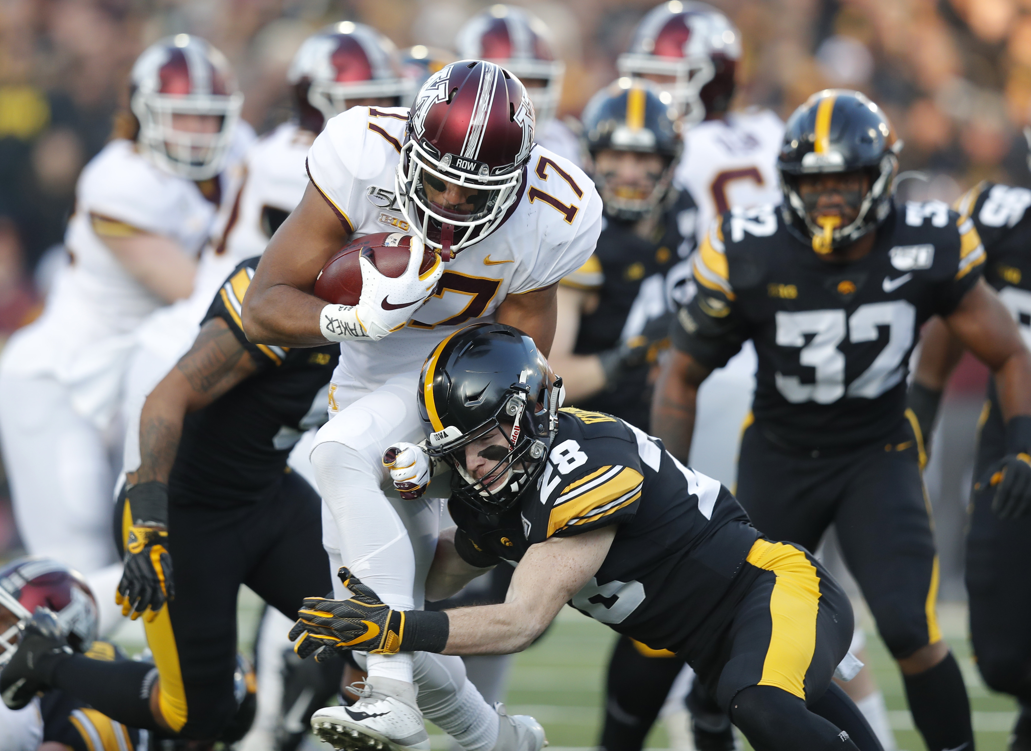 No. 23 Iowa hands No. 7 Minnesota its first loss, 23-19