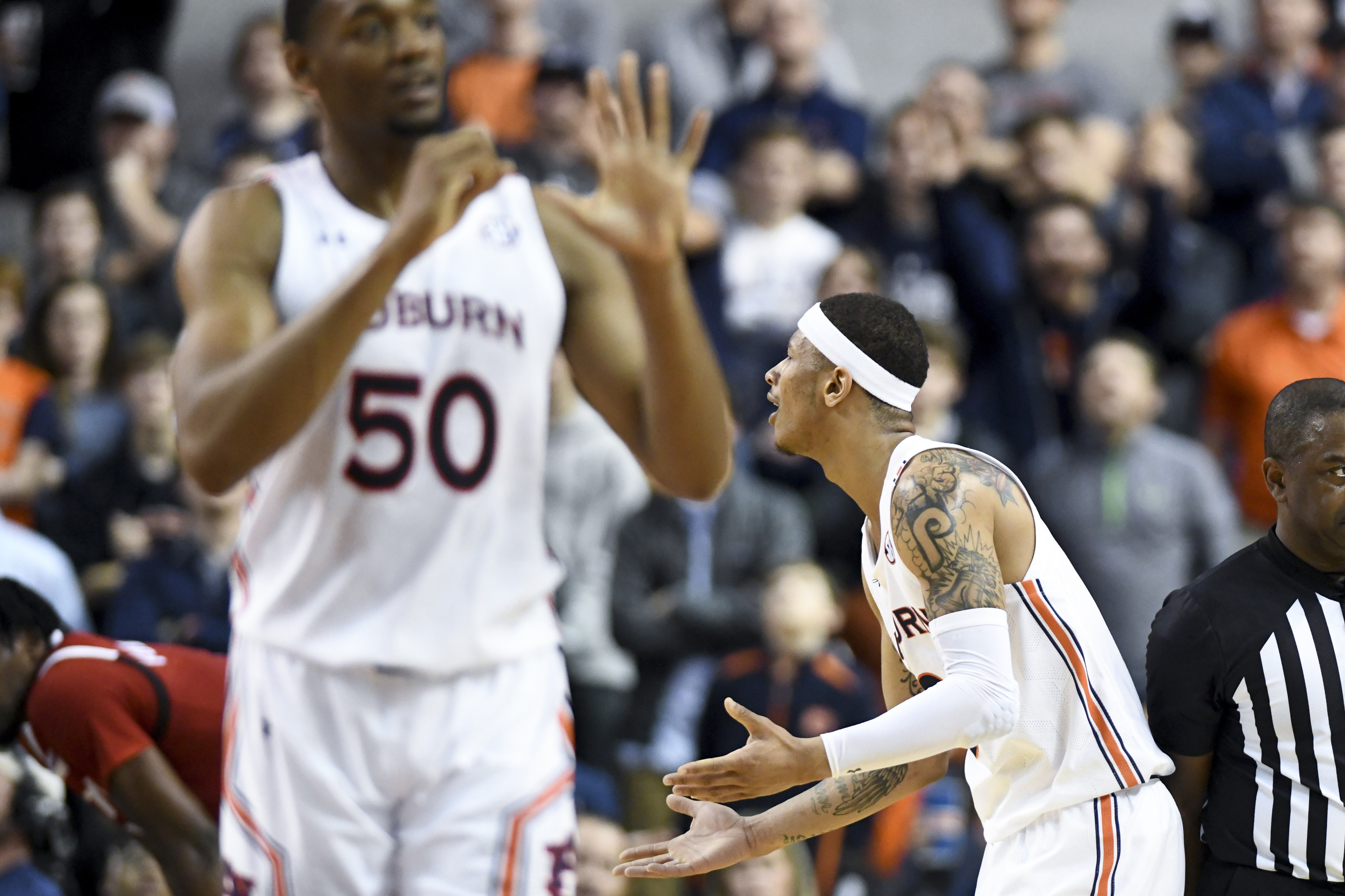 Doughty rallies No. 12 Auburn for 79-73 win over NC State