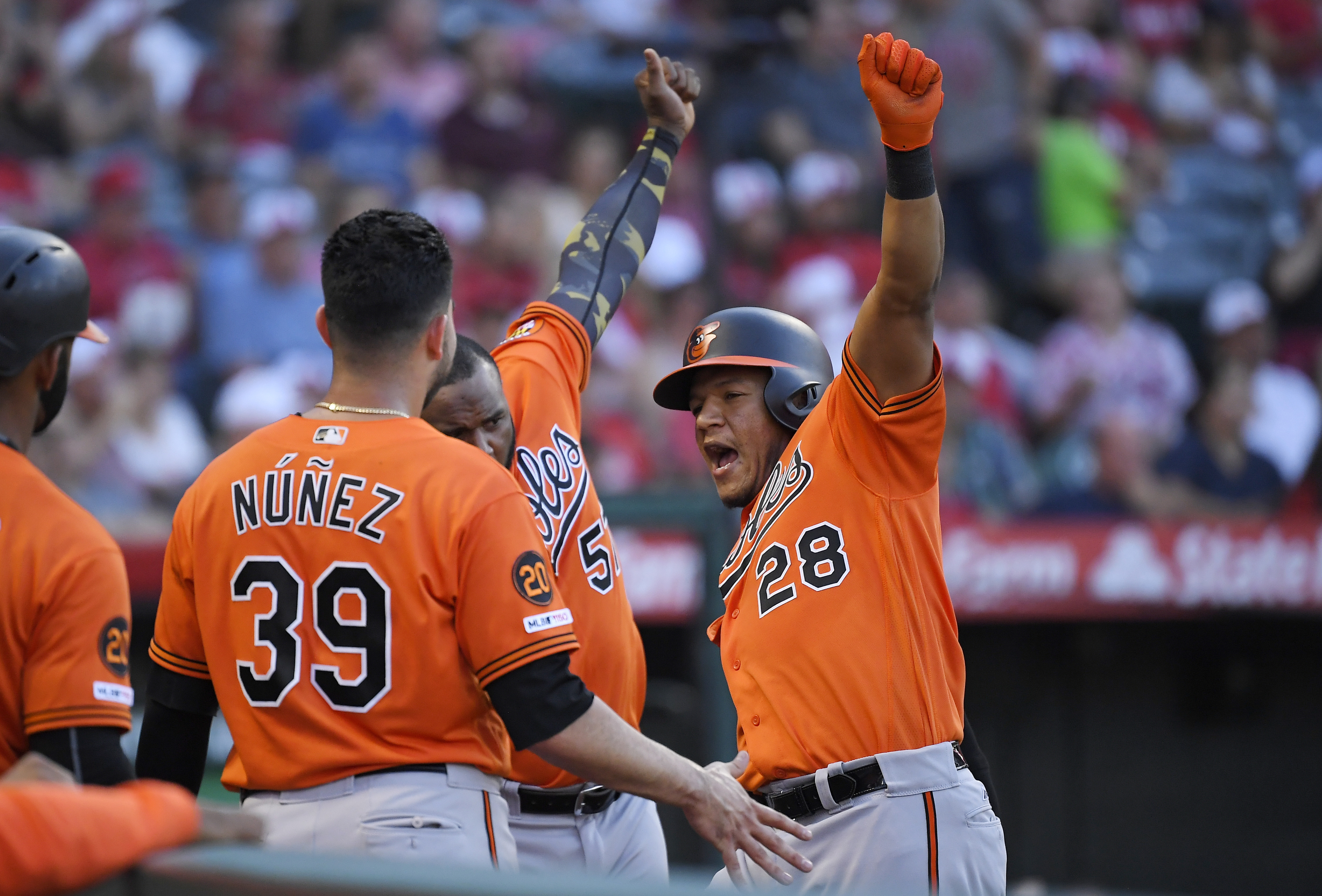 Orioles set homer mark in 8-7 win over Angels