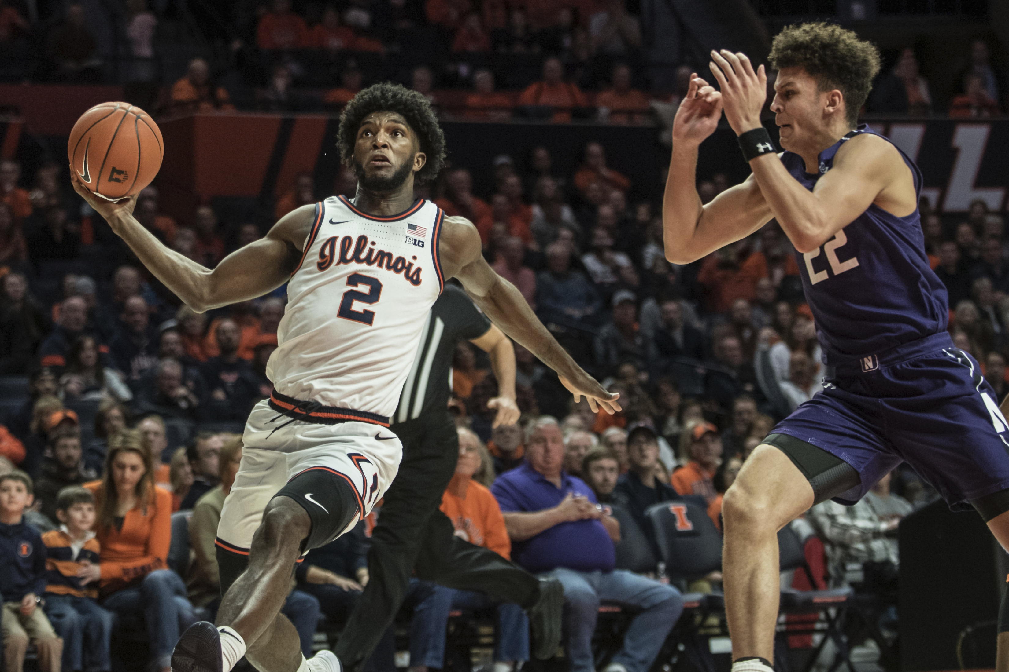 No. 24 Illinois hangs on to beat Northwestern 75-71