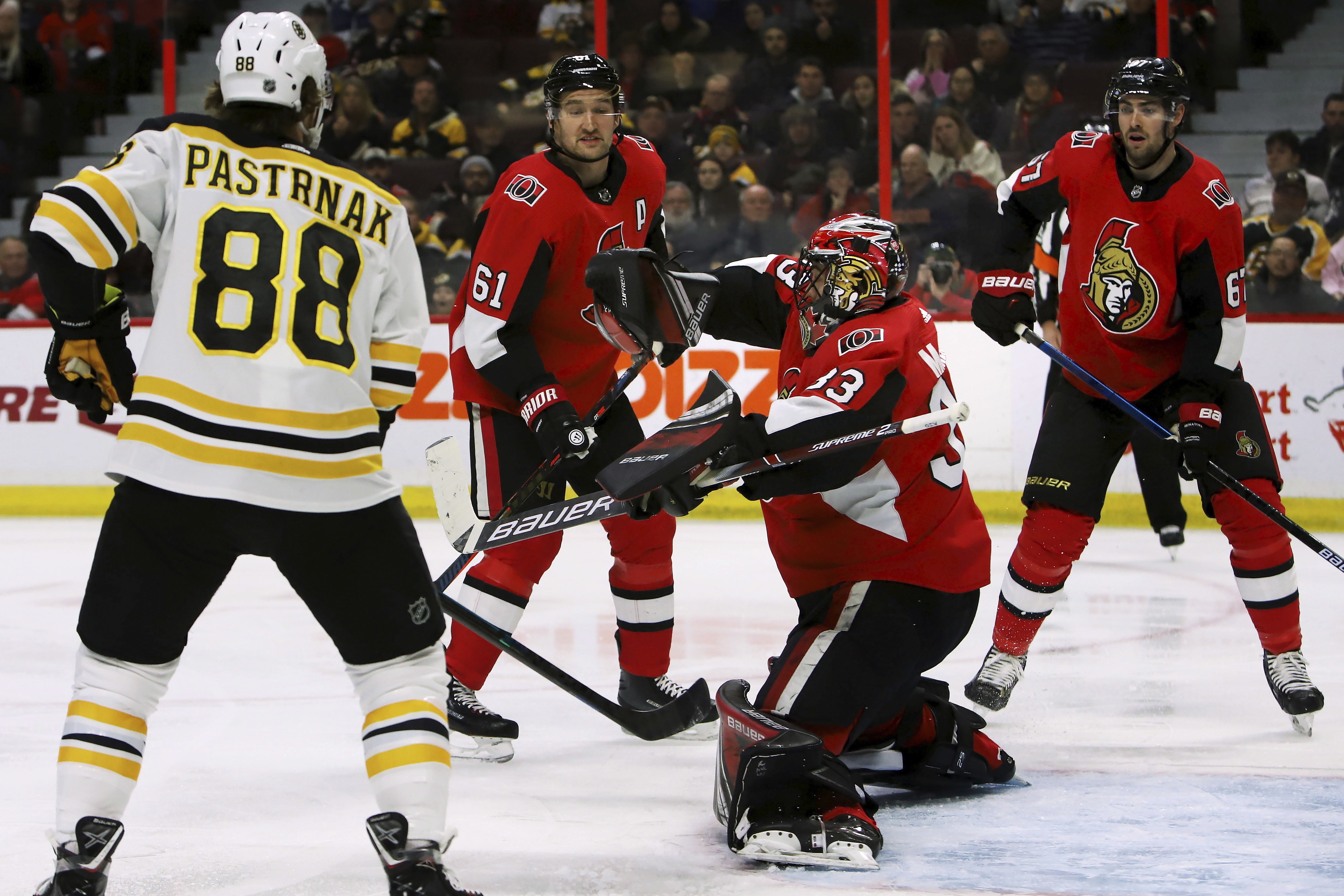 Krug scores in OT to lift Bruins over Senators 2-1
