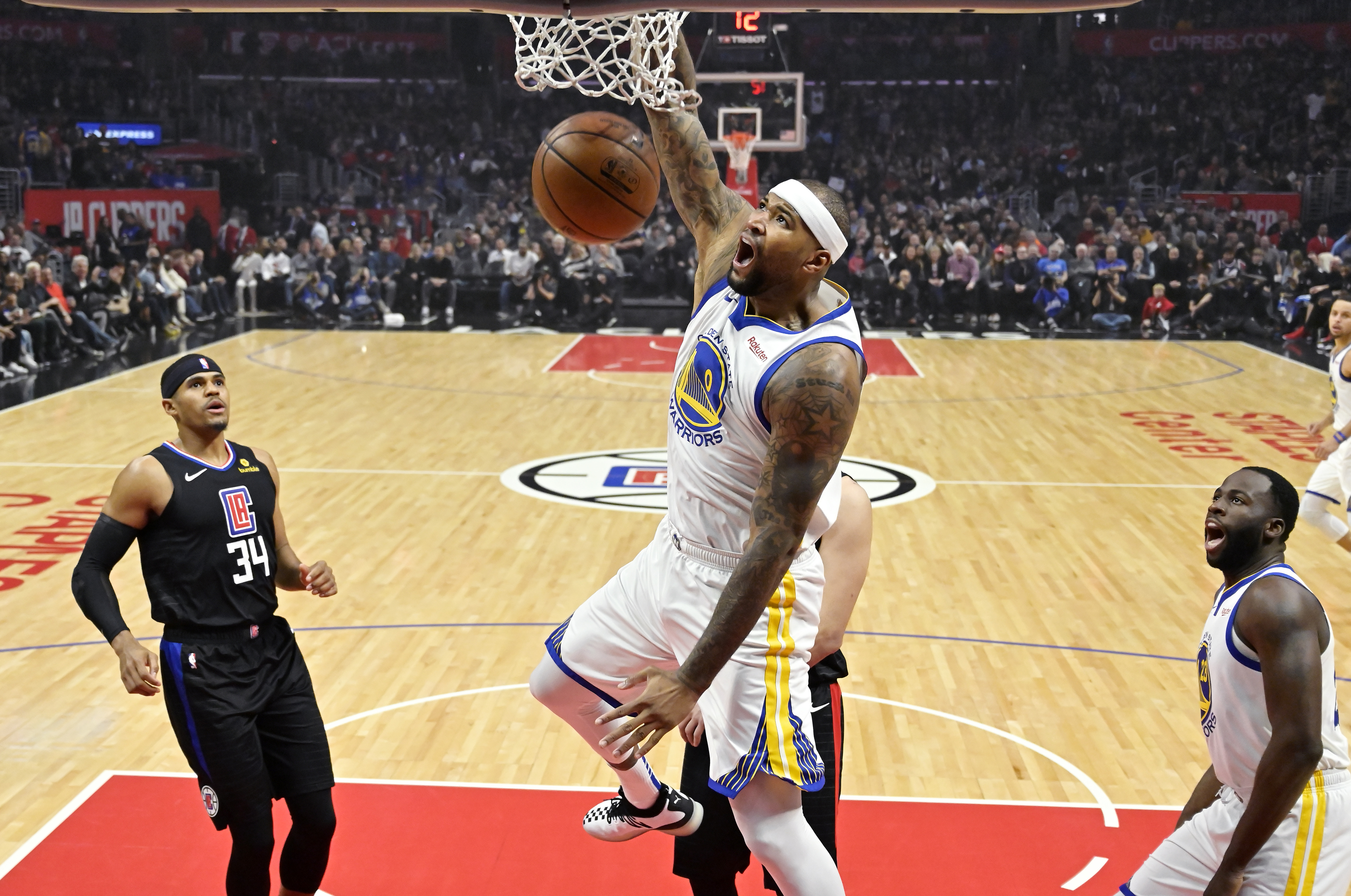 Warriors beat Clippers 112-94; Boogie fouls out of debut