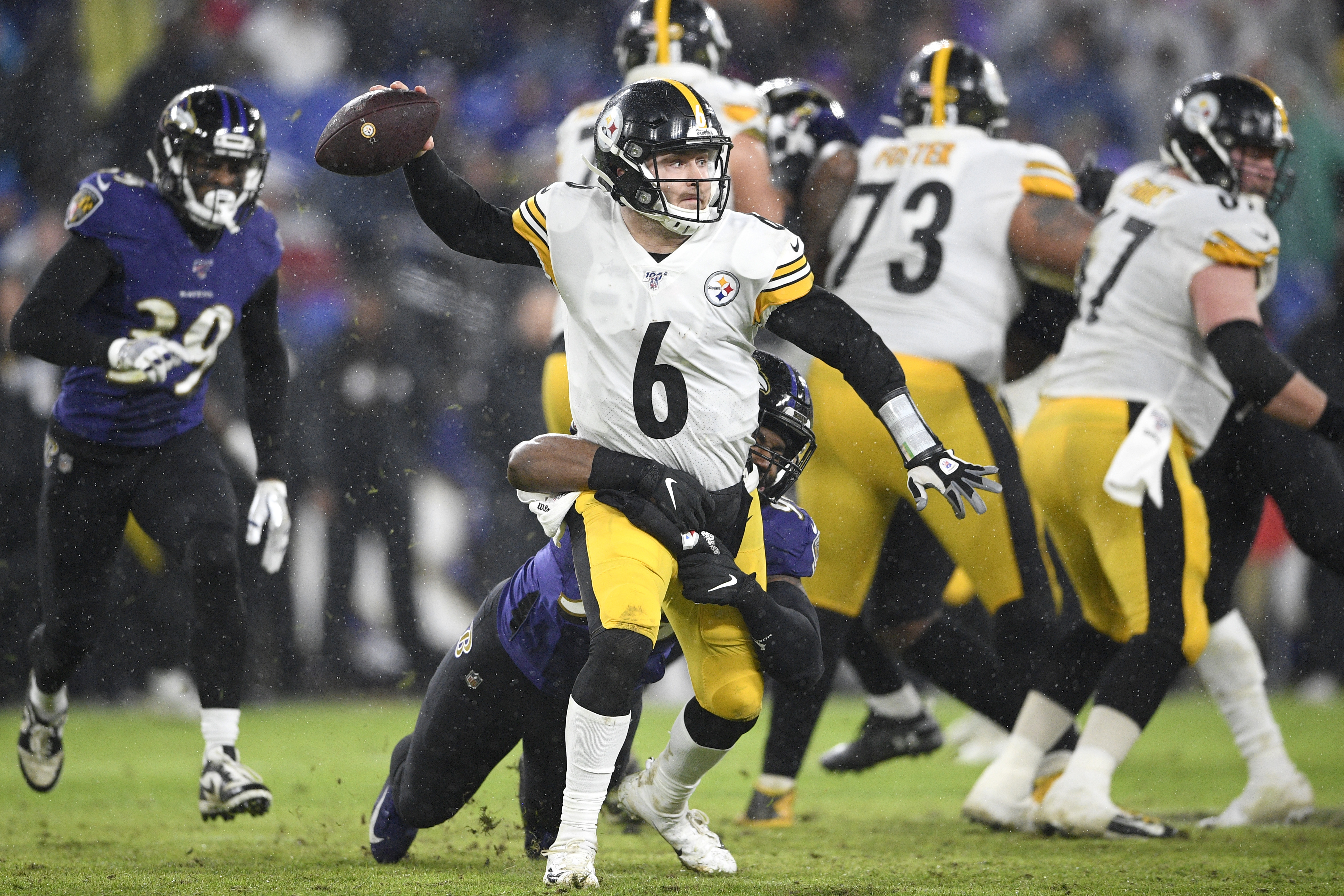 Steelers' season ends in heavy rain and with sea of mistakes