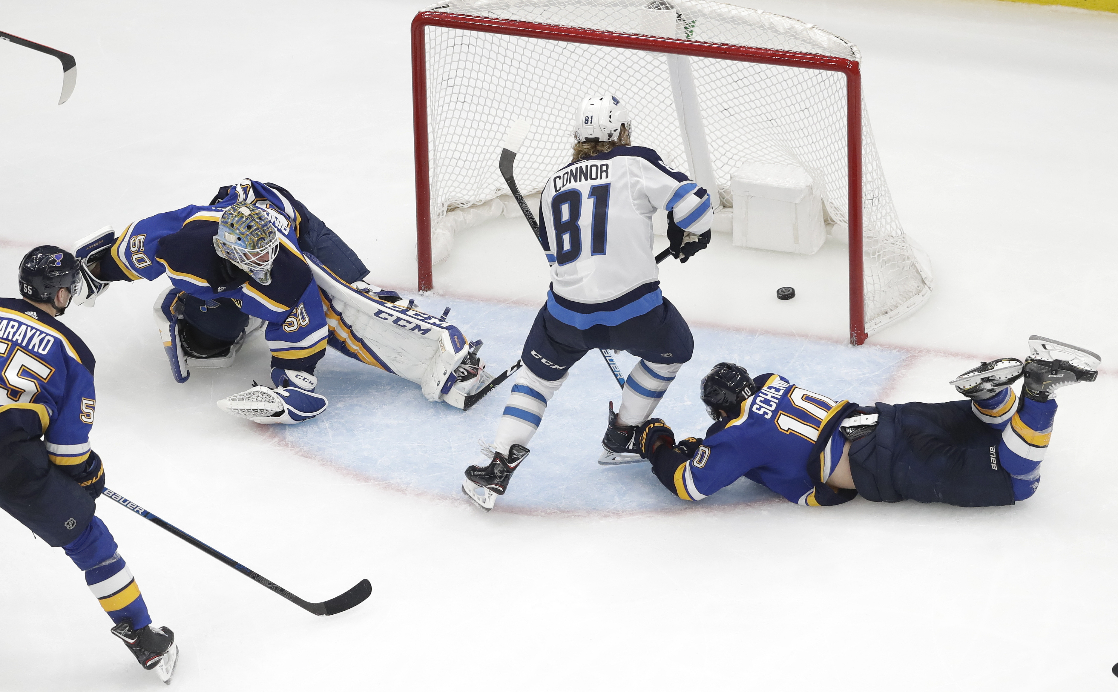 Connor scores in OT as Jets beat Blues 2-1 to even series