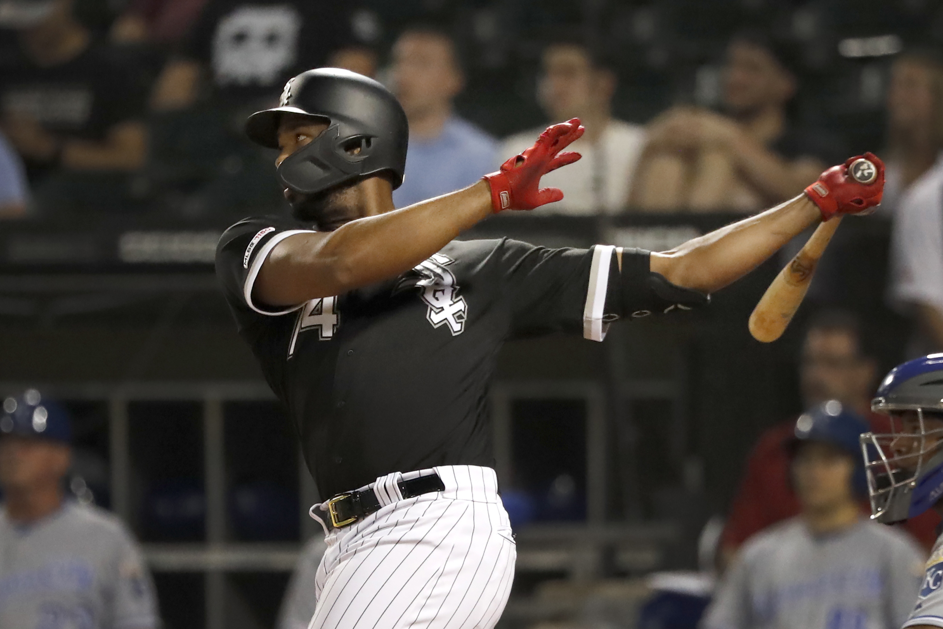 Jiménez slam helps White Sox power past Royals 7-3