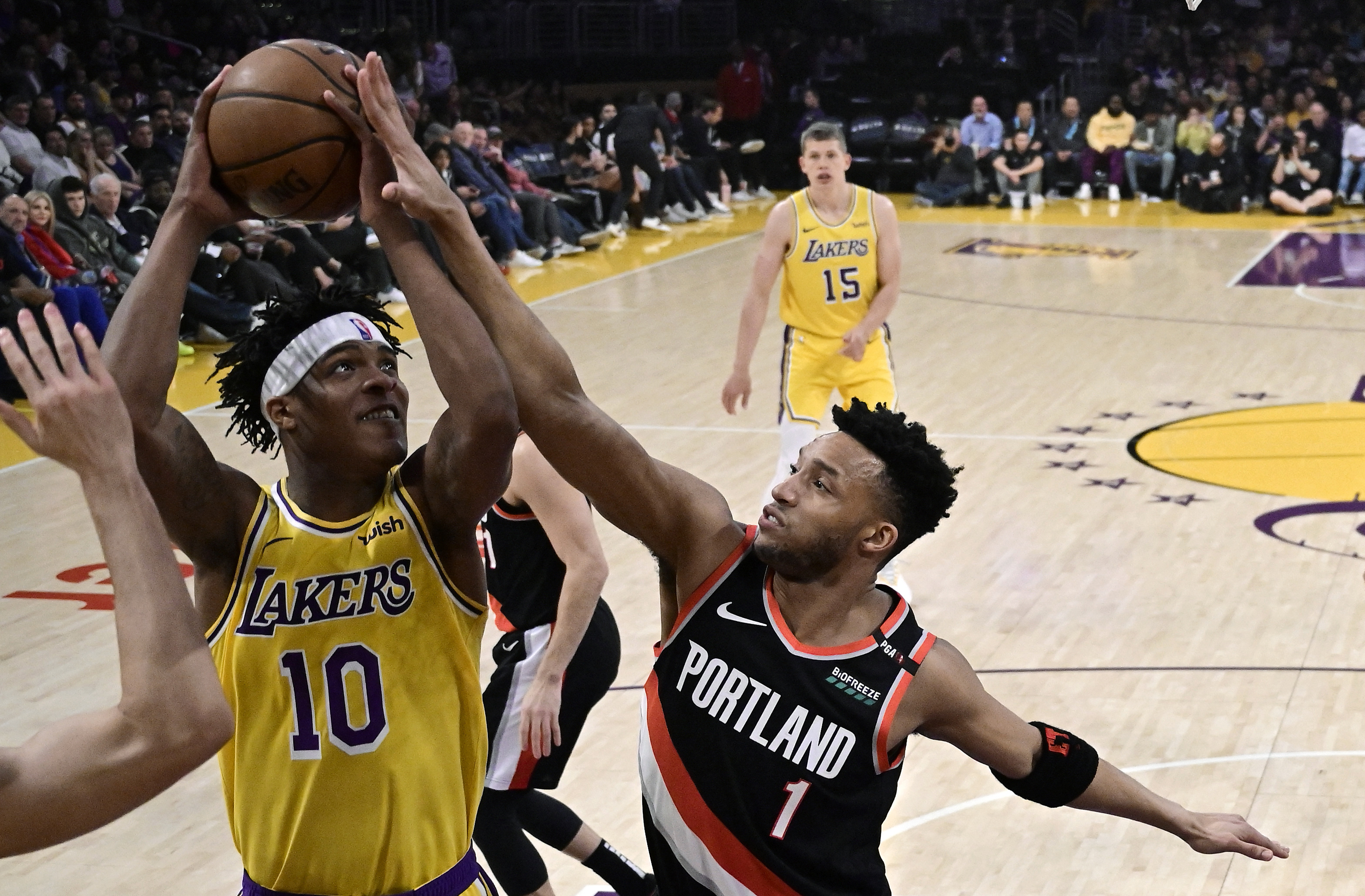 Harkless’ 3 sends Blazers past LA 104-101 after Magic quits