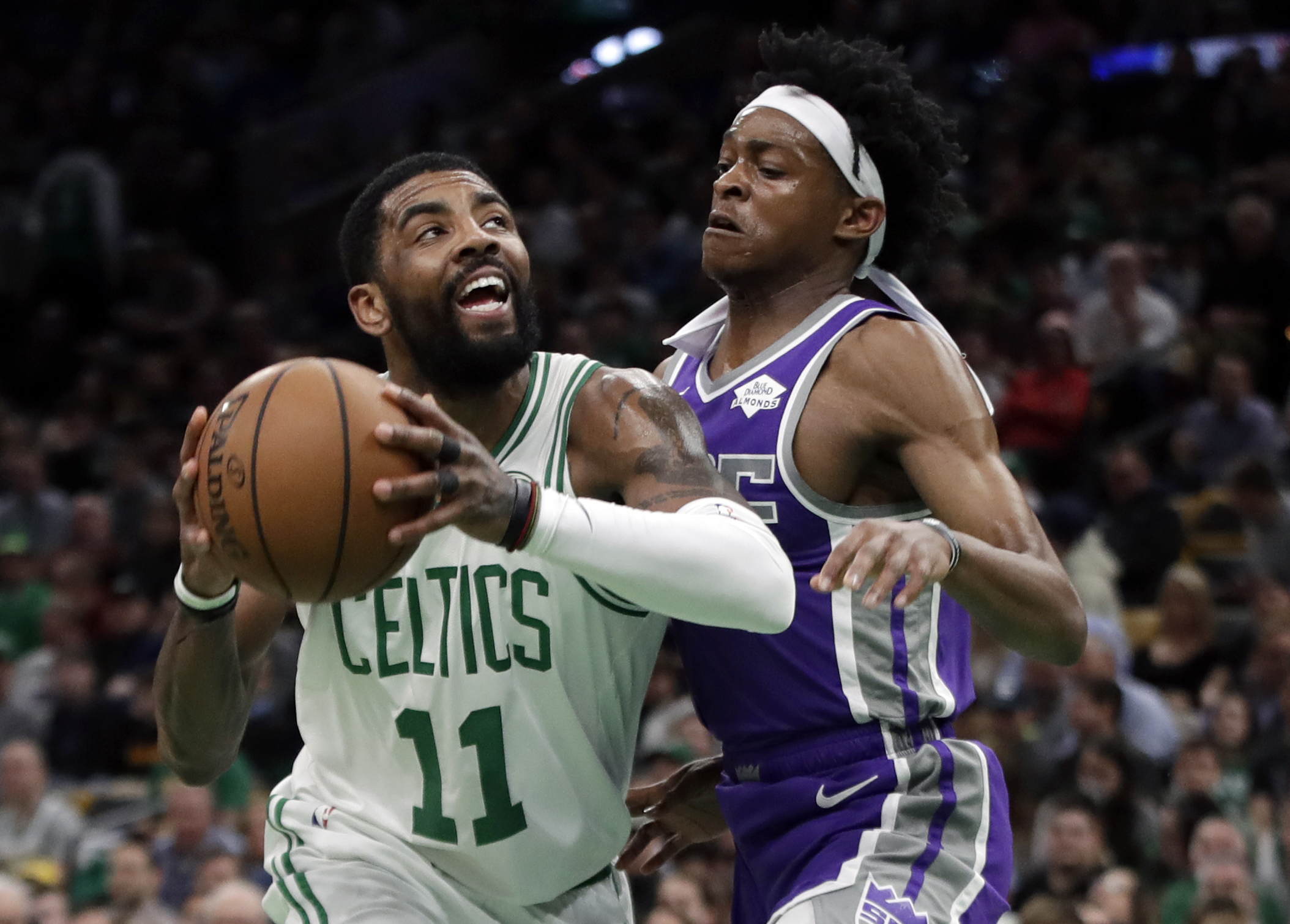 Irving’s triple-double leads Celtics past Kings 126-120