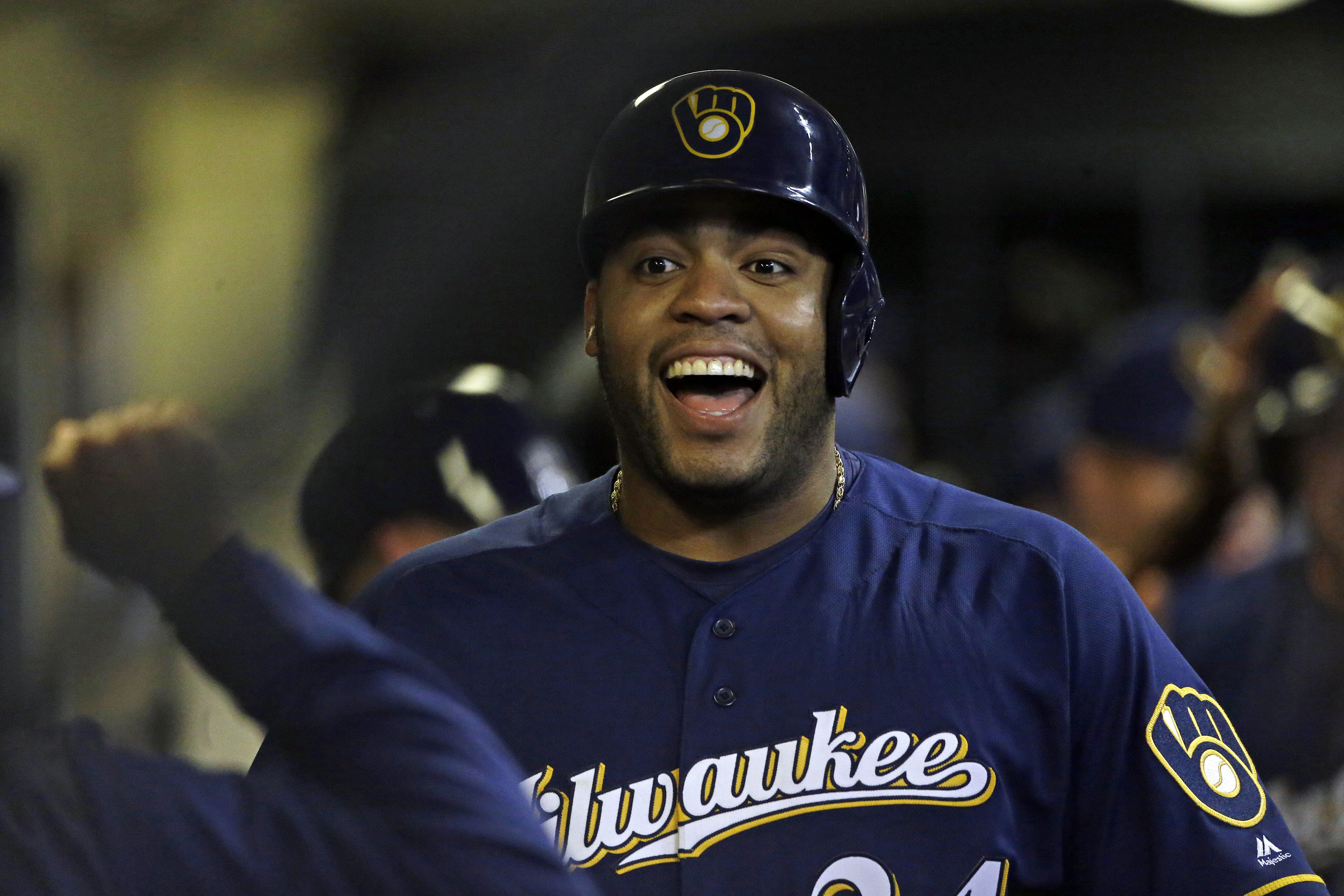 Aguilar homers, Brewers come through late to beat Rockies