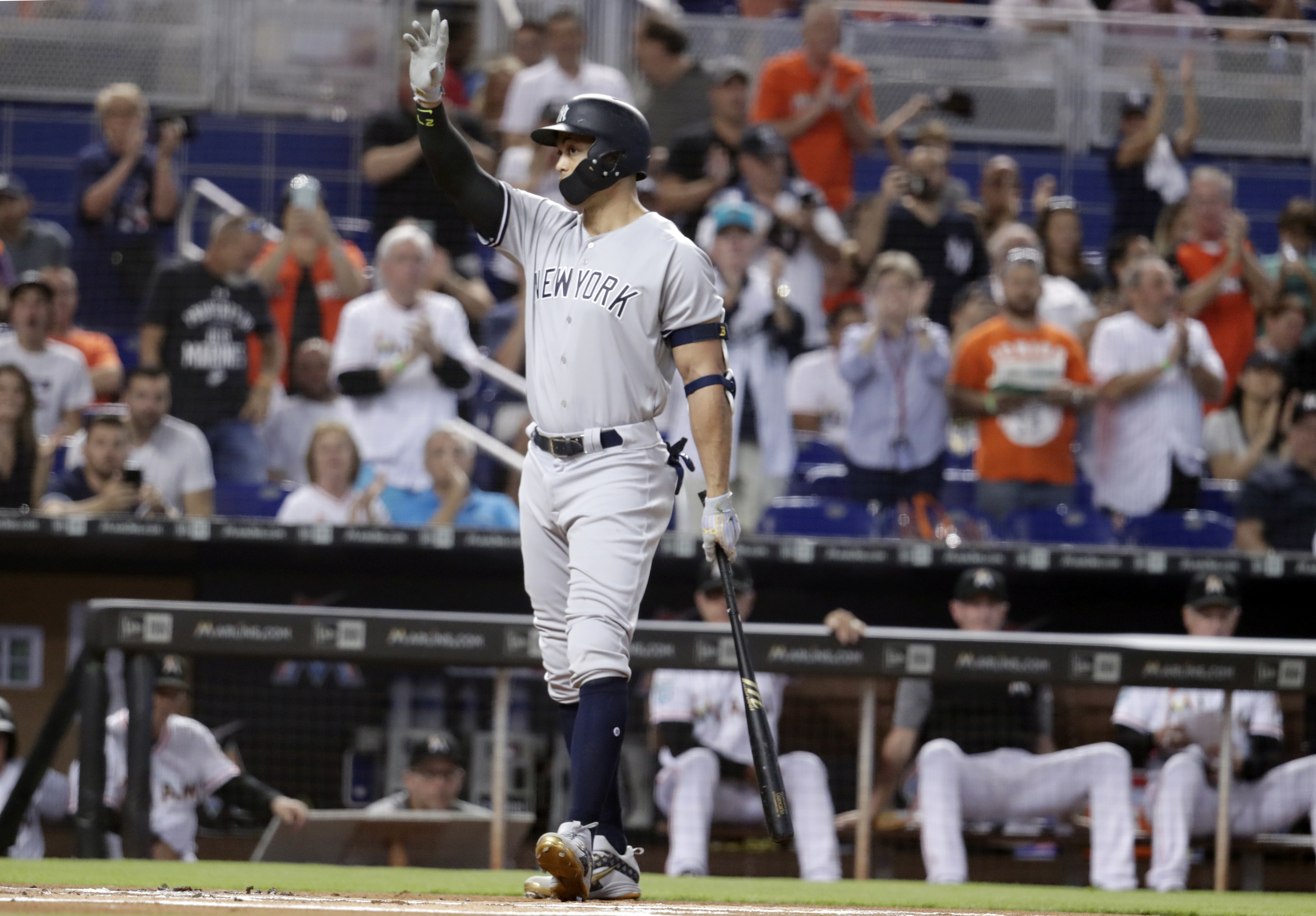 Stanton 2 hits, Chapman exits, Yank top Marlins in 12, 2-1