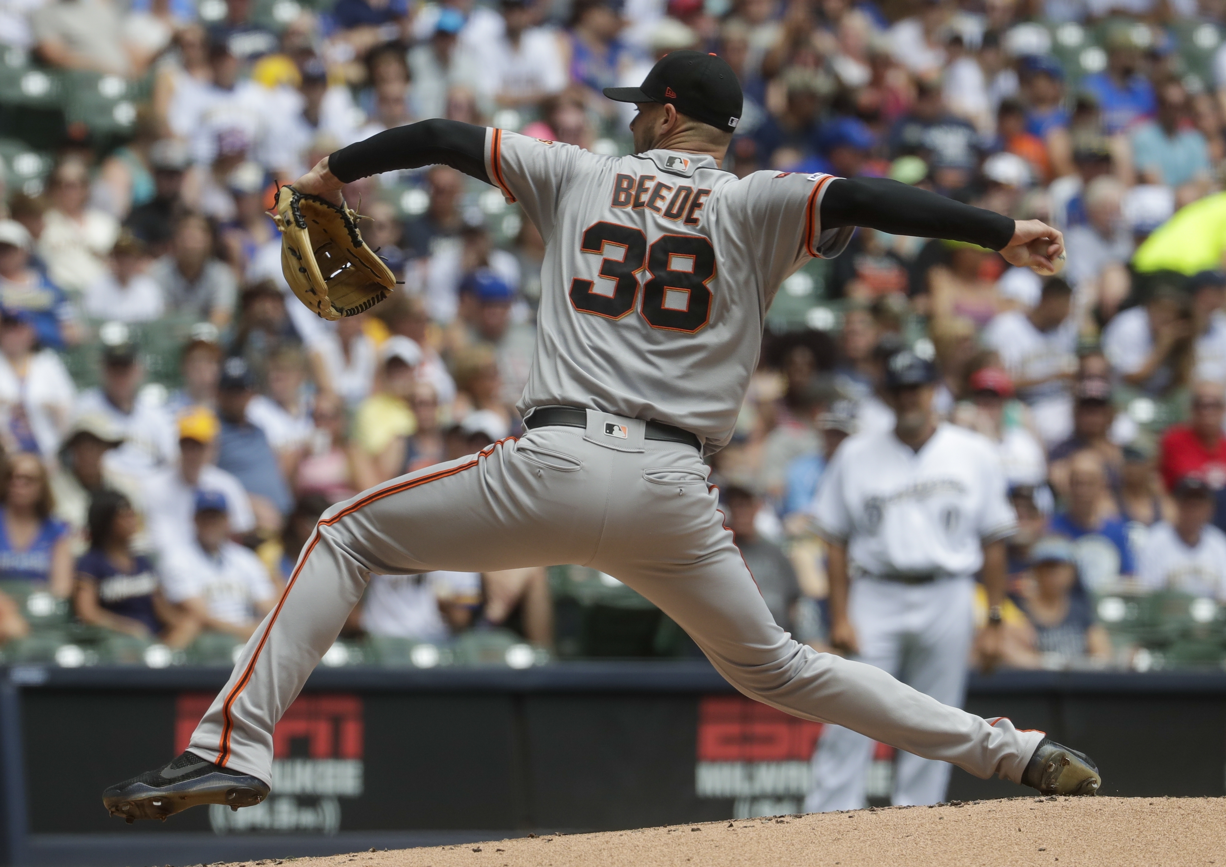 Beede's pitching, hitting lead Giants past Brewers 8-3