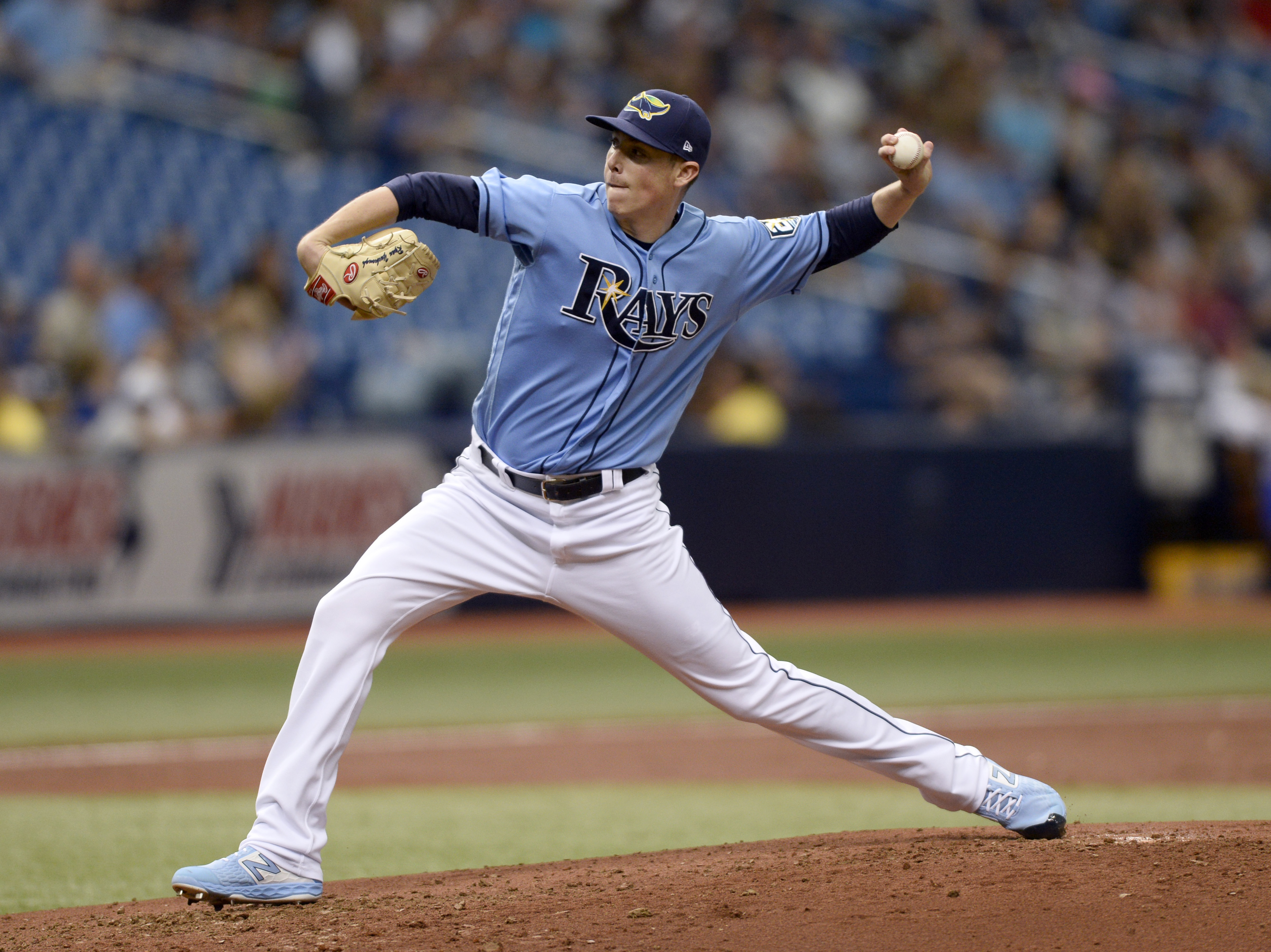 Rays use bullpen to beat Blue Jays 9-4 for 90th win