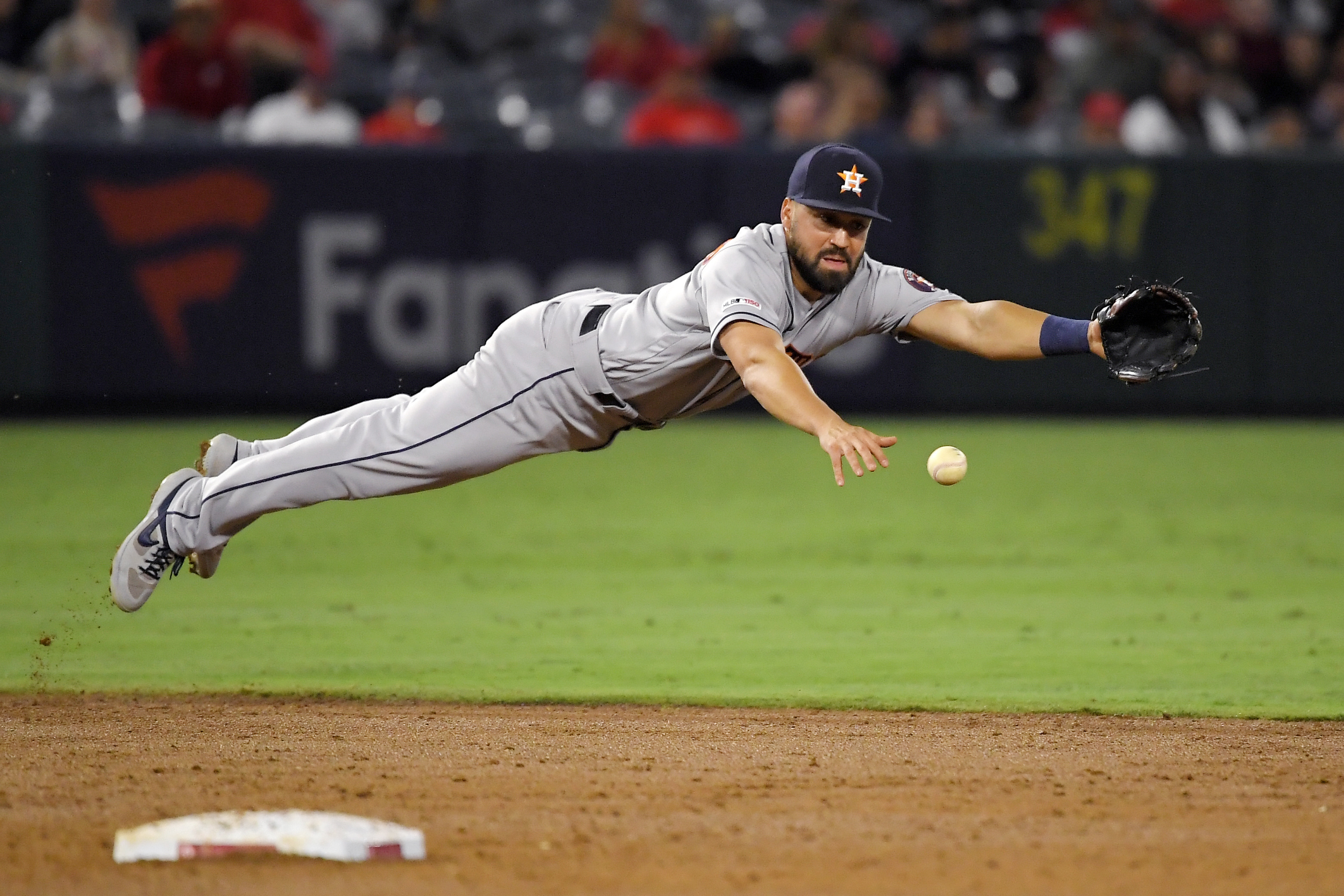 Angels outlast Astros 4-3 in 12, preventing Houston clinch