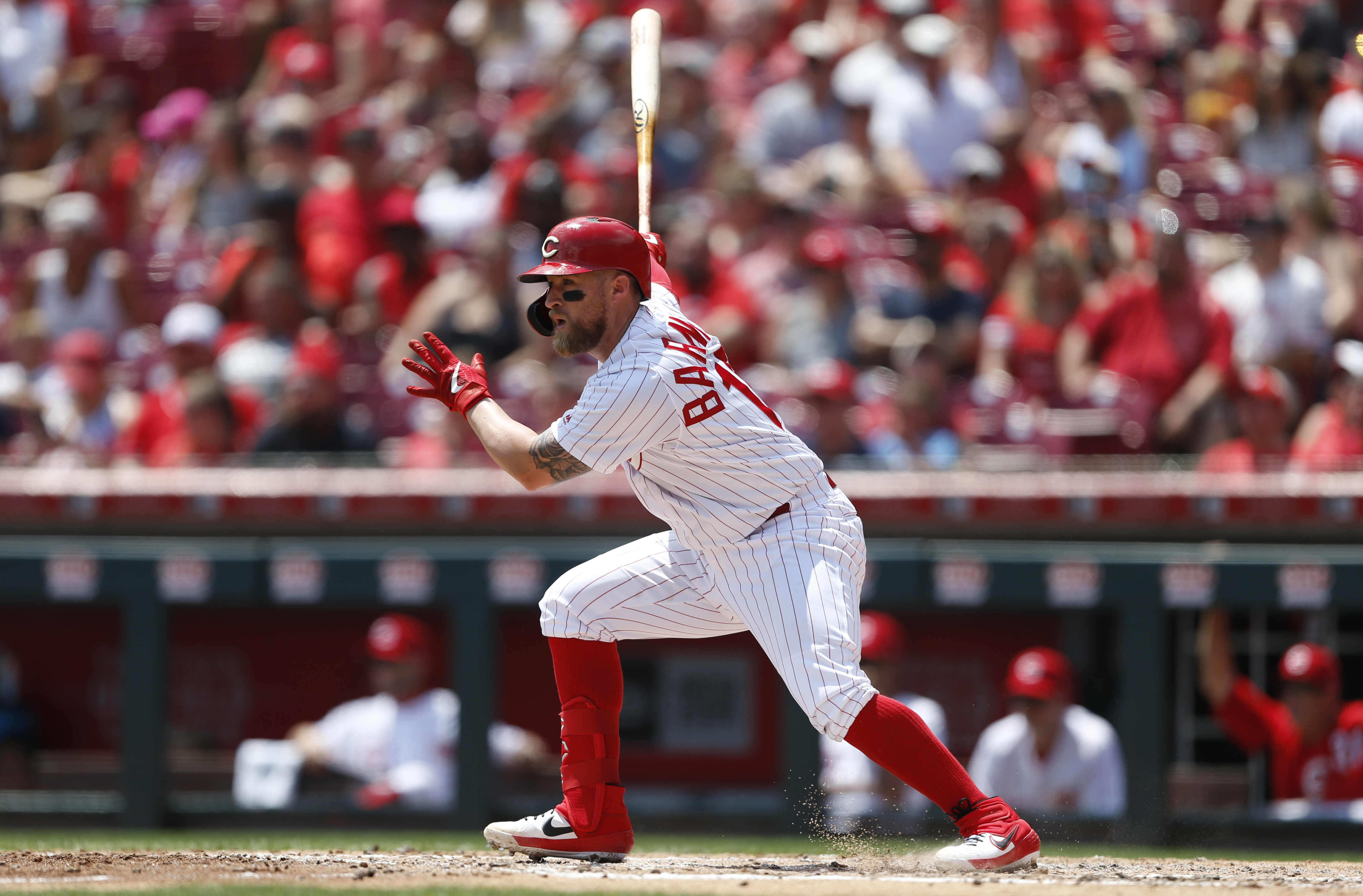 Barnhart RBI single leads Reds to 3-2 win over Rockies