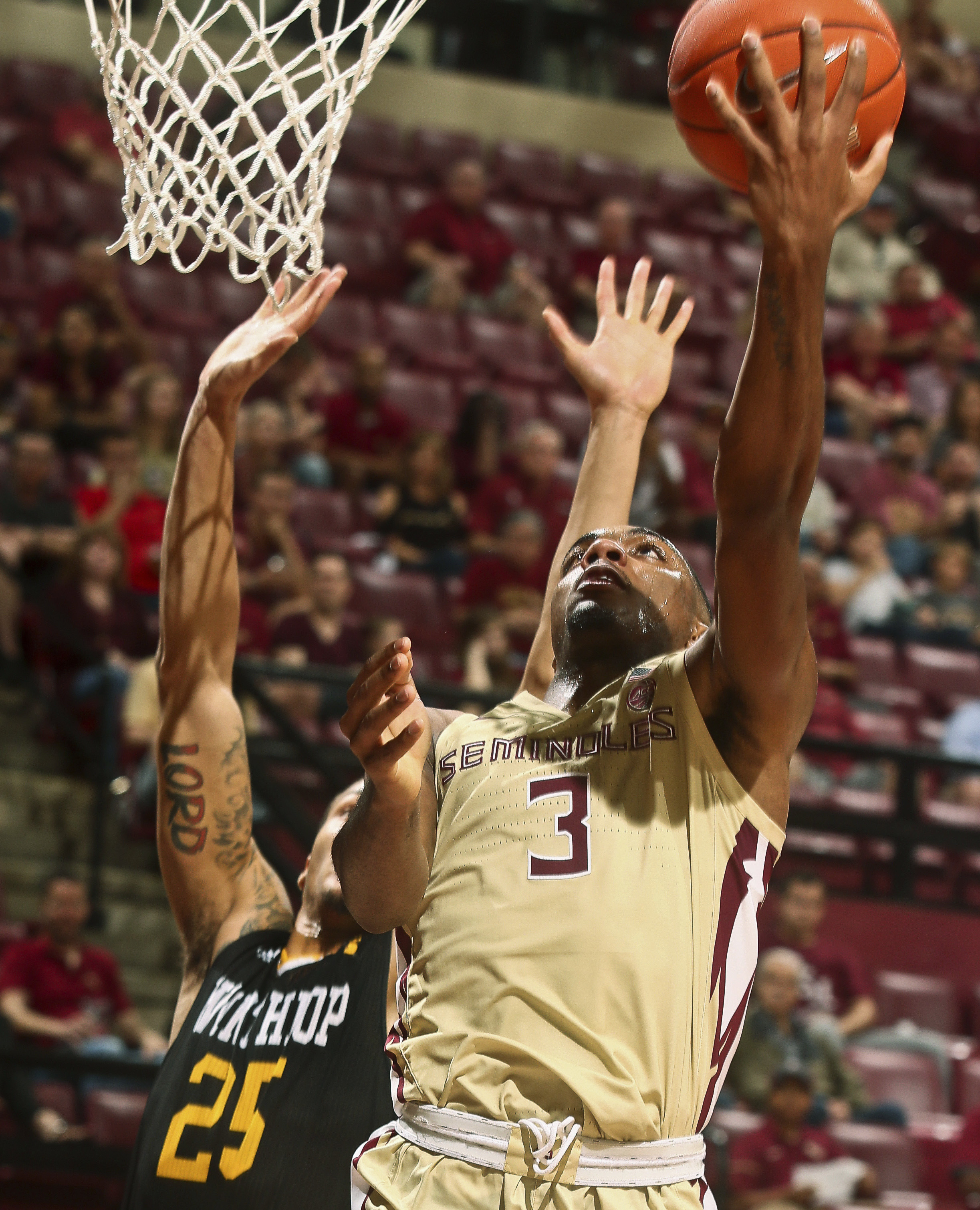 No. 9 Florida State holds off Winthrop 87-76