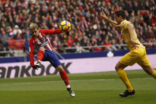 Atletico, Valencia stumble in pursuit of leader Barcelona