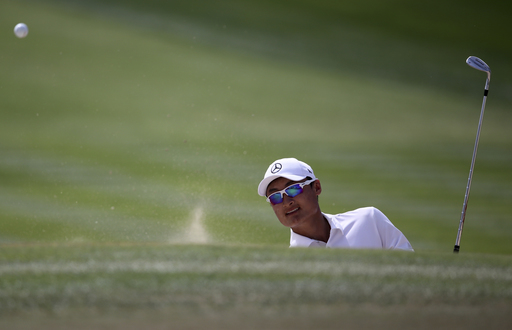 Haotong Li tops Rory McIlroy to win Dubai Desert Classic