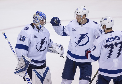 Gourde, Lightning jump to big lead in 4-2 win over Canucks