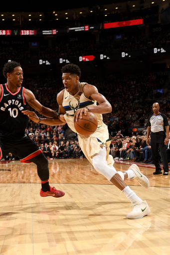 Antetokounmpo scores 26, Bucks beat Raptors 122-119 in OT