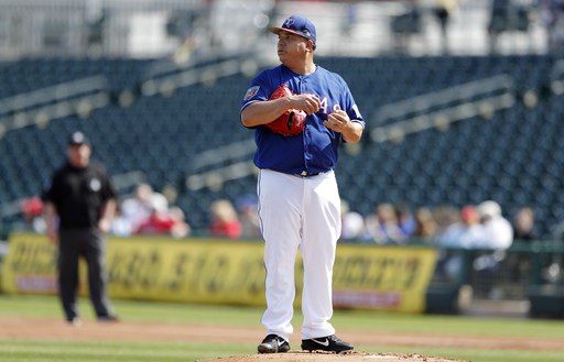 Colon still throwing strikes in his spring debut for Rangers
