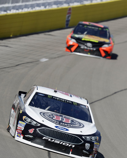 The Latest: Harvick roars to 1st-stage win in Vegas race