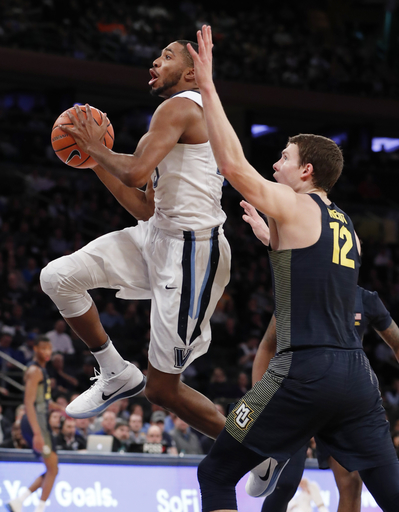 Wright wins 414th game as No. 2 Nova tops Marquette