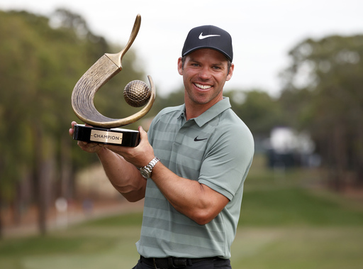 Casey wins at Innisbrook as Woods come up short by a putt