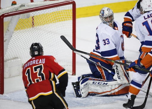 Gibson makes 50 saves, Islanders beat Flames 5-2 to end skid