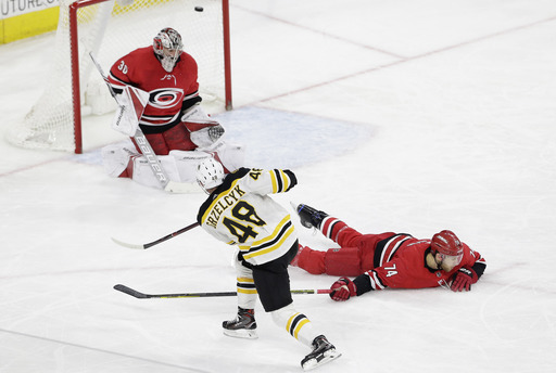 Pastrnak gets hat trick, Bruins rally to stun Hurricanes 6-4