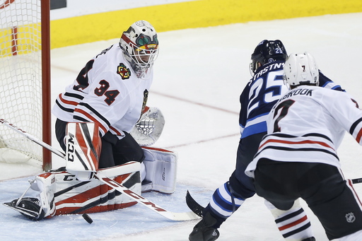 Connor scores twice, Jets beat Blackhawks 6-2